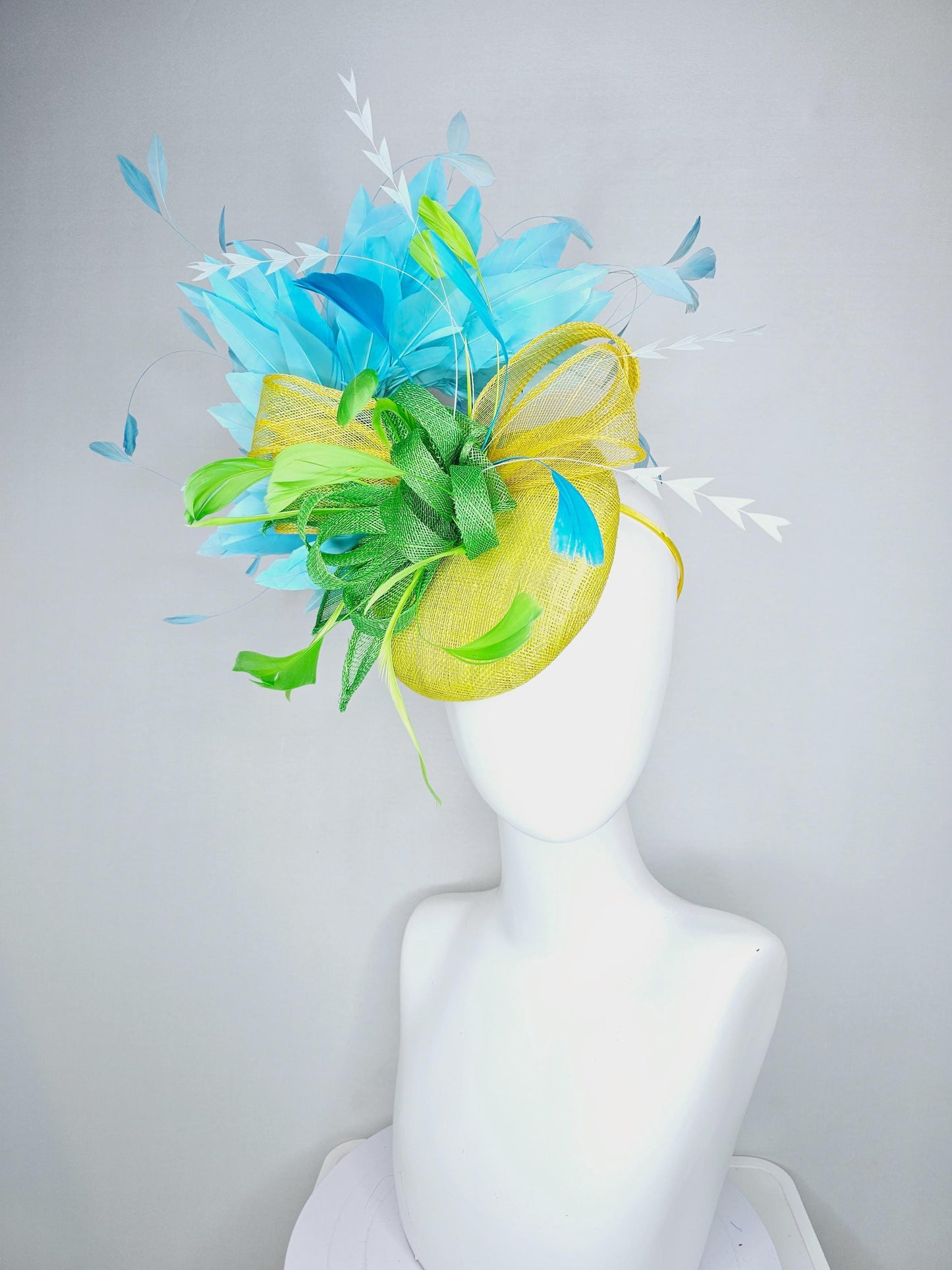 kentucky derby hat fascinator yellow sinamay with yellow and lime green sinamay bow white cut feathers and sky blue branching feathers