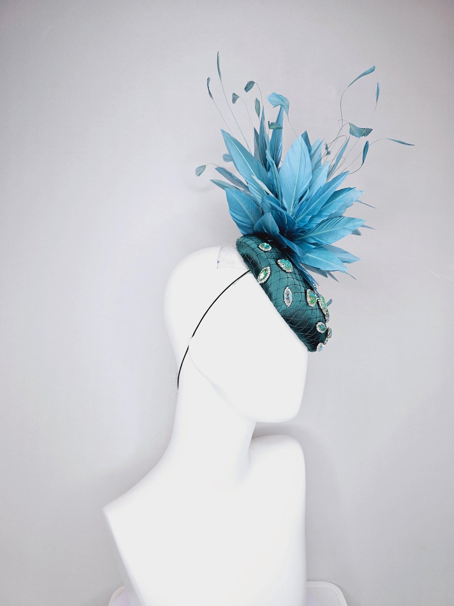 kentucky derby hat fascinator dark green satin with netting and green iridescent crystal rhinestone beaded fluffy peacock teal blue feathers
