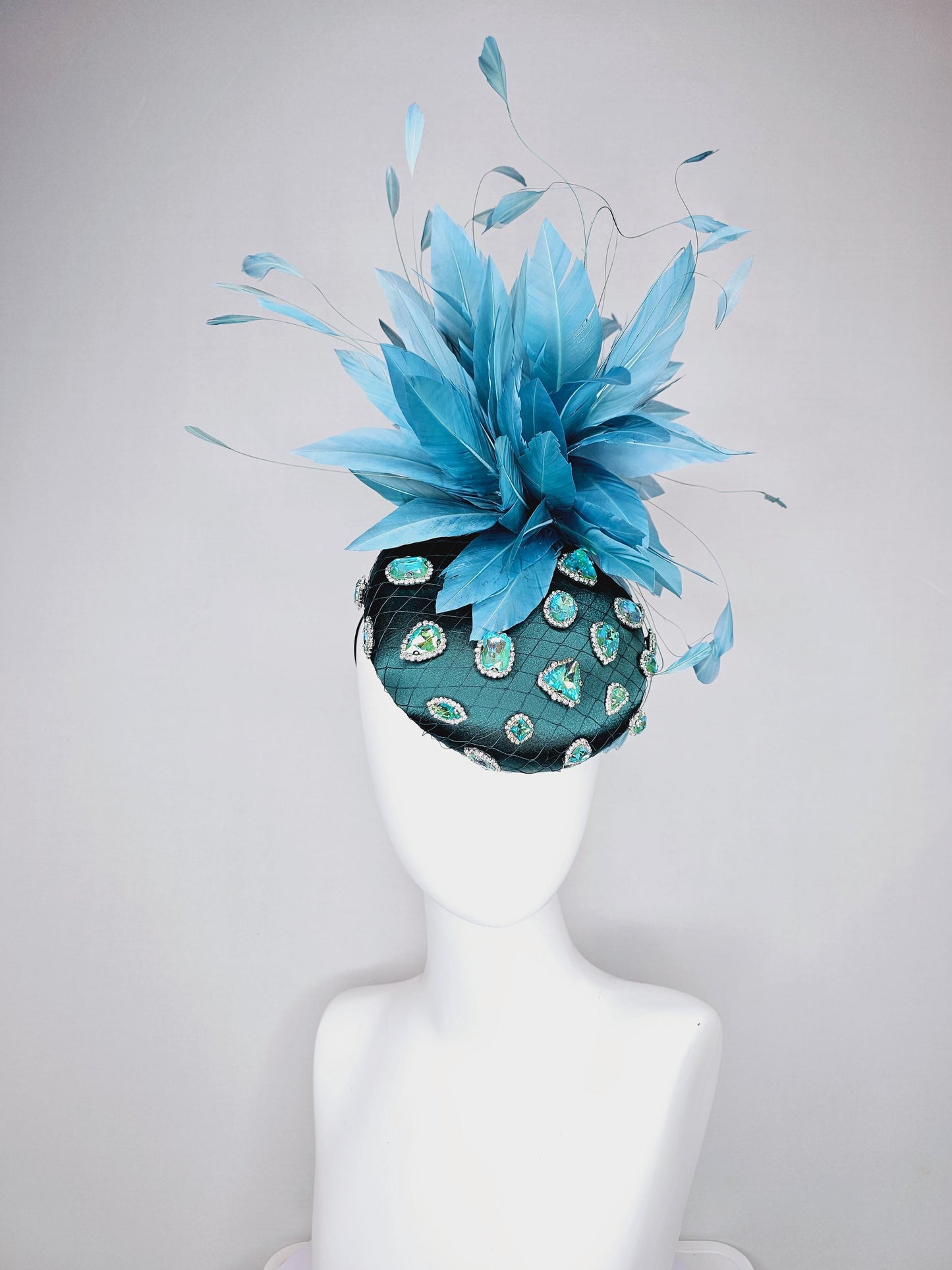 kentucky derby hat fascinator dark green satin with netting and green iridescent crystal rhinestone beaded fluffy peacock teal blue feathers