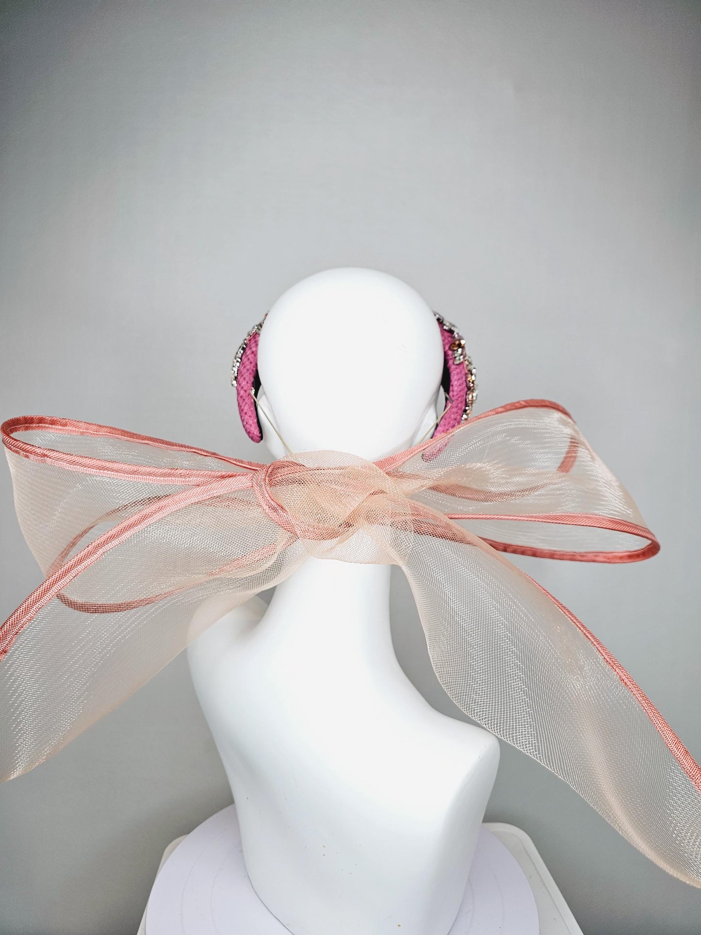 kentucky derby hat fascinator pink headband with iridescent pink tones crystal rhinestone encrusted jewels large dusty blush pink mesh bow