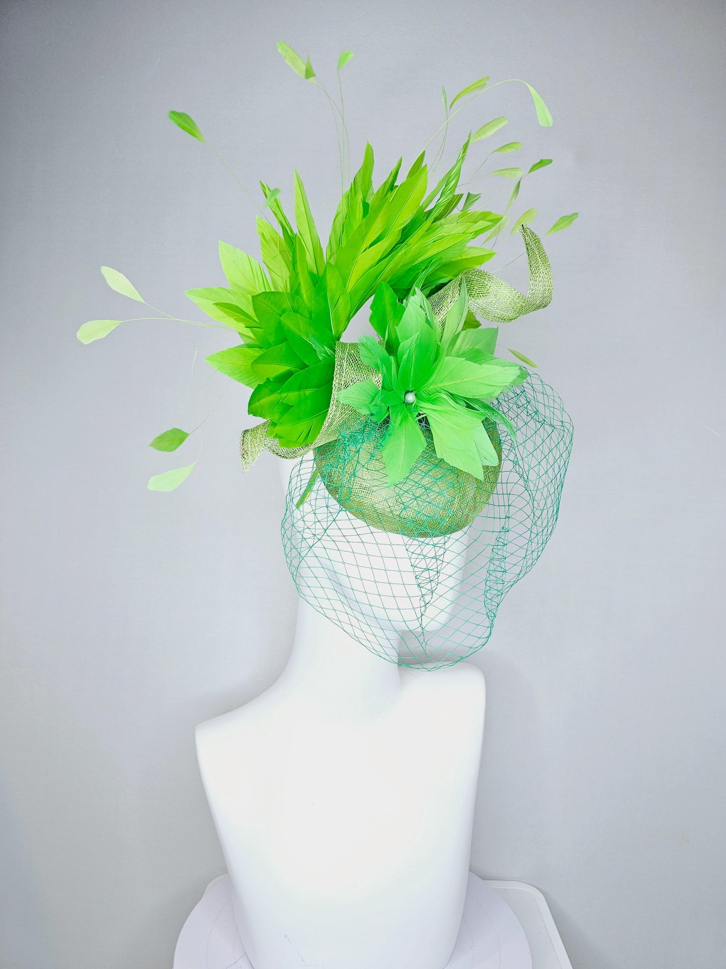 kentucky derby hat fascinator lime green sinamay with sinamay curls bright green feather flower lime green feathers with green mesh veil