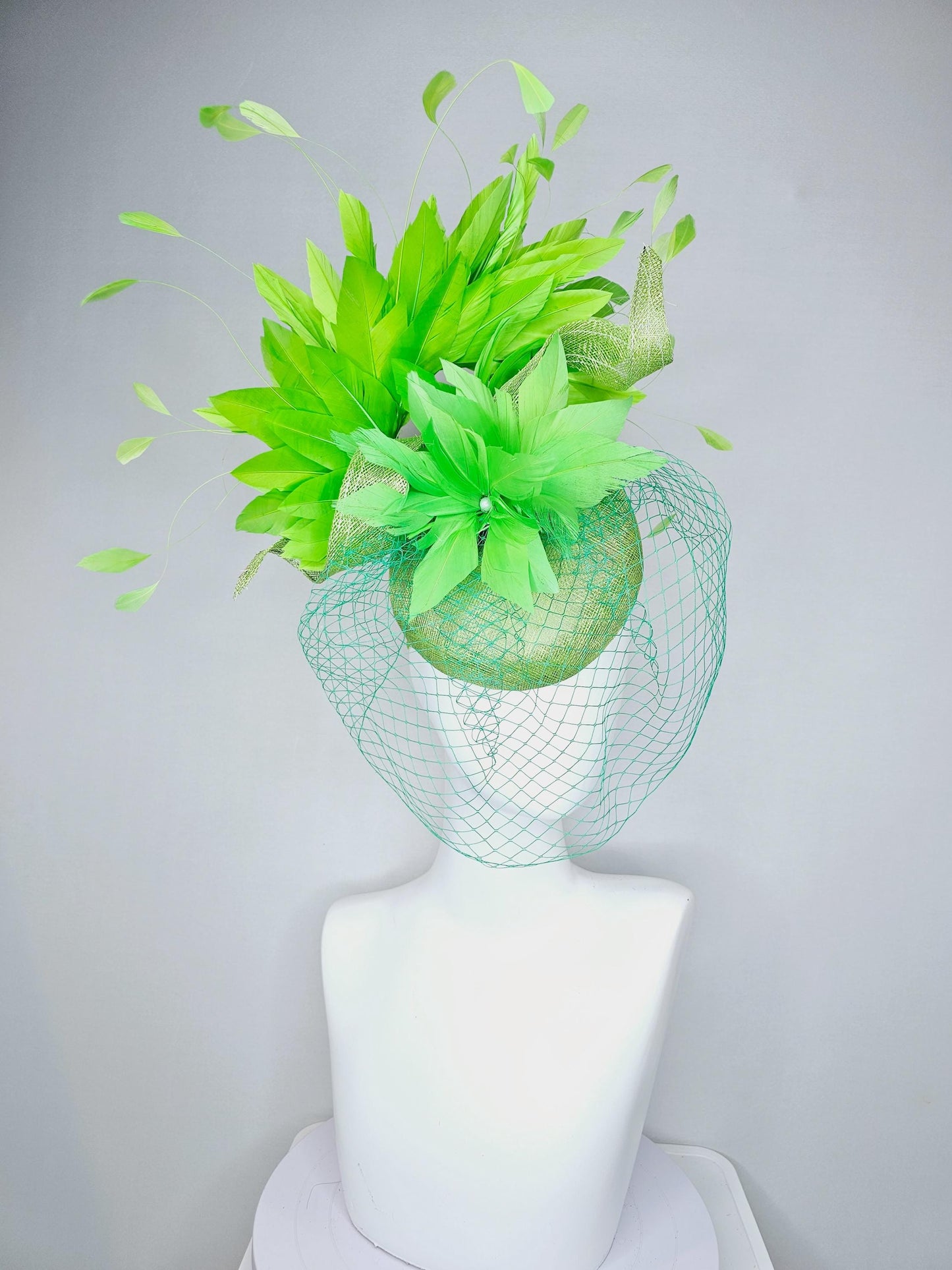 kentucky derby hat fascinator lime green sinamay with sinamay curls bright green feather flower lime green feathers with green mesh veil