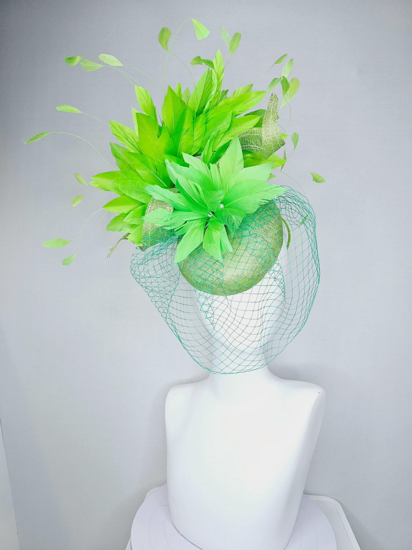 kentucky derby hat fascinator lime green sinamay with sinamay curls bright green feather flower lime green feathers with green mesh veil