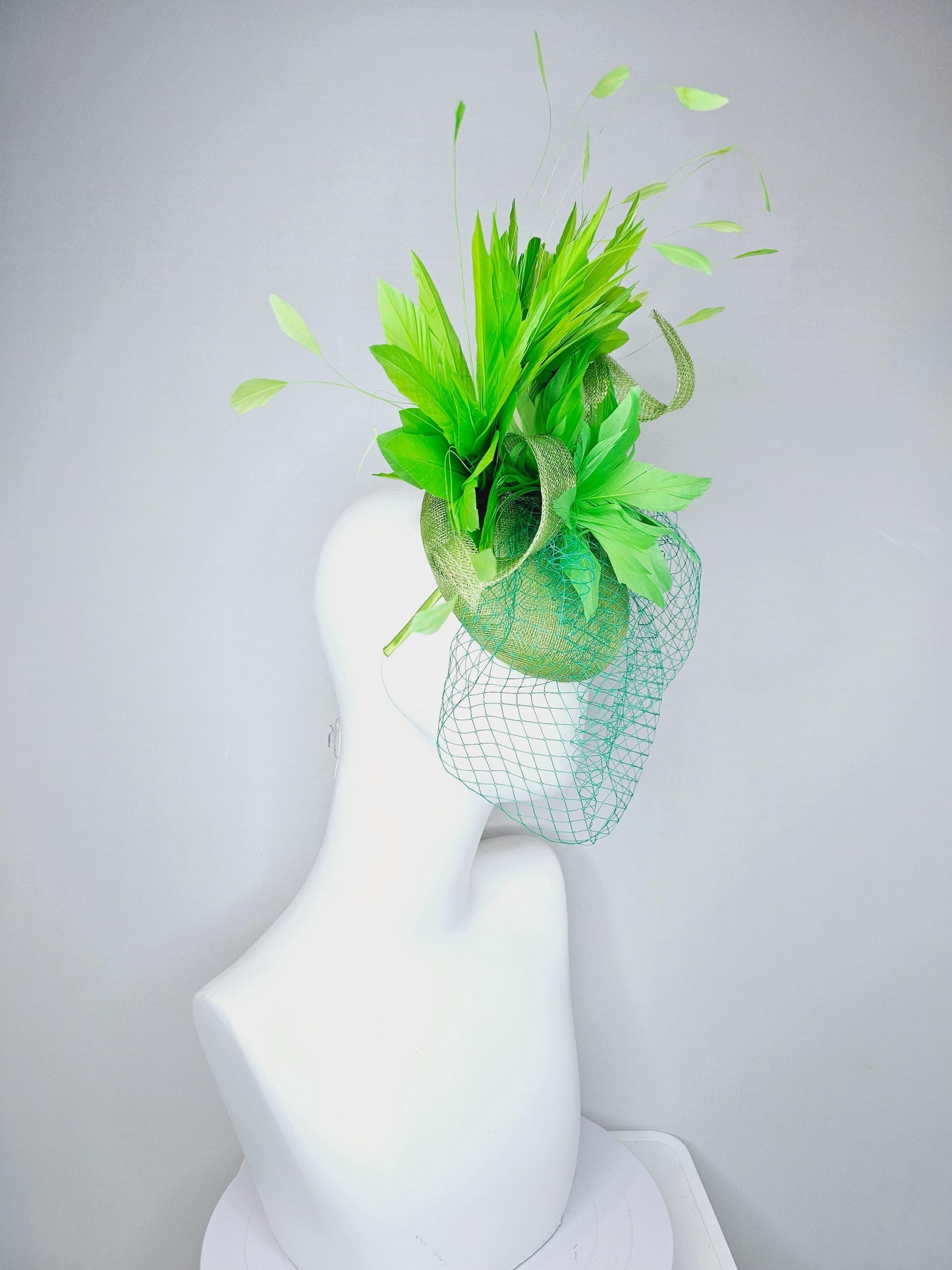 kentucky derby hat fascinator lime green sinamay with sinamay curls bright green feather flower lime green feathers with green mesh veil