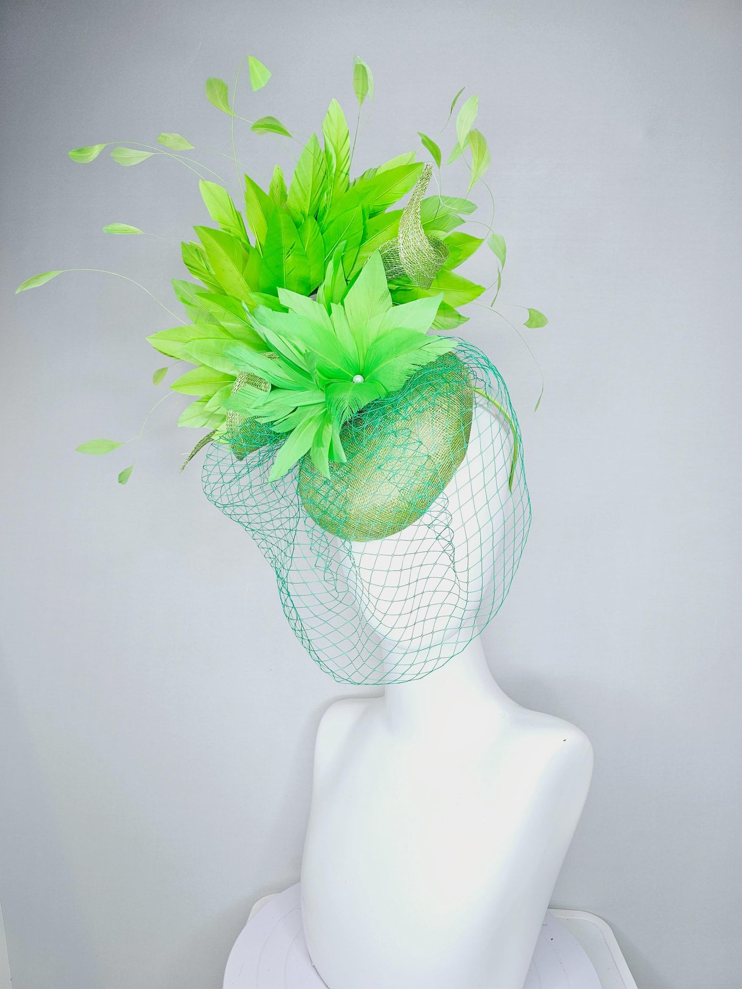 kentucky derby hat fascinator lime green sinamay with sinamay curls bright green feather flower lime green feathers with green mesh veil