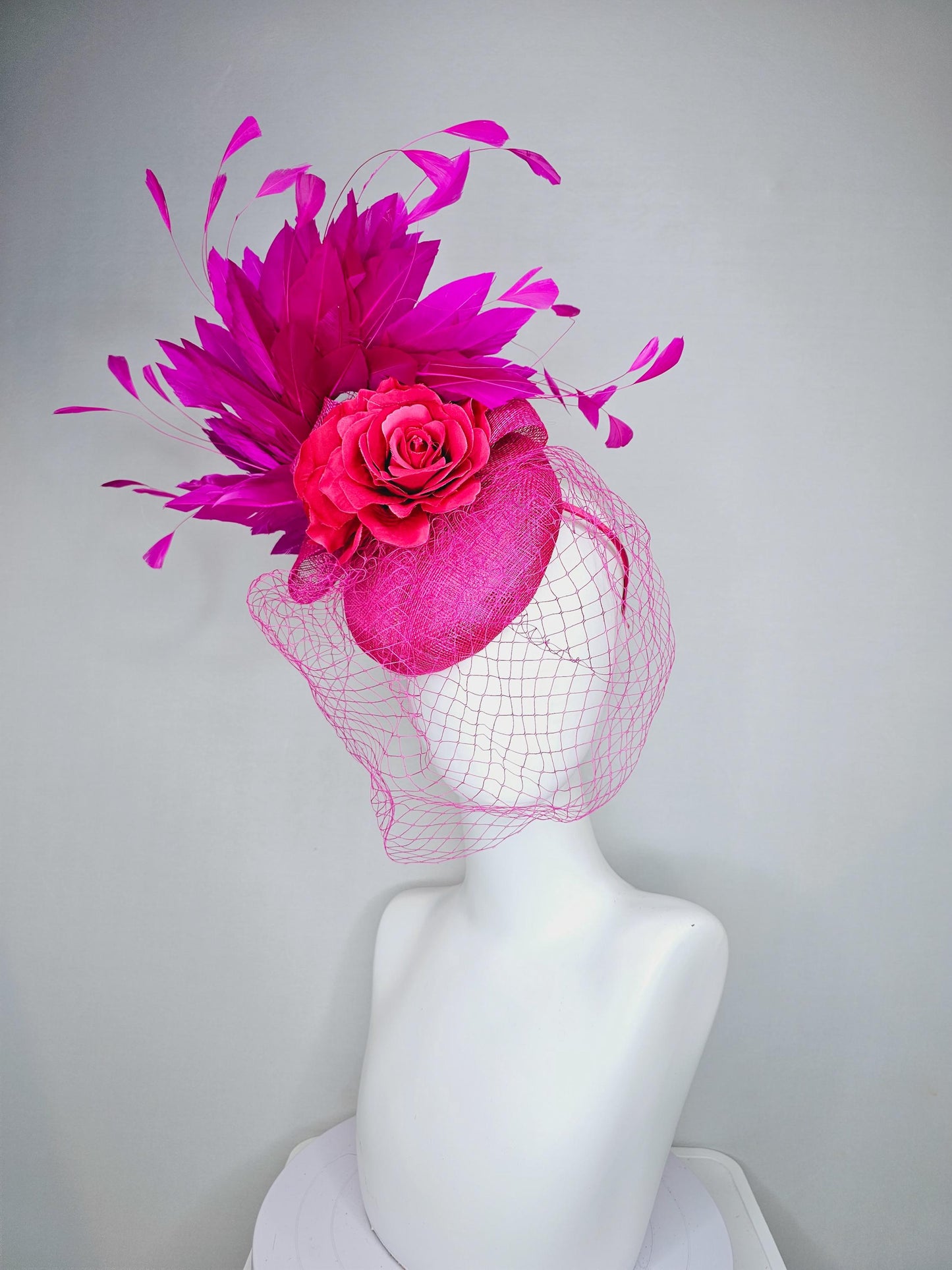 kentucky derby hat fascinator bright pink sinamay with sinamay bow and raspberry pink satin roses fuchsia pink feathers and pink mesh veil