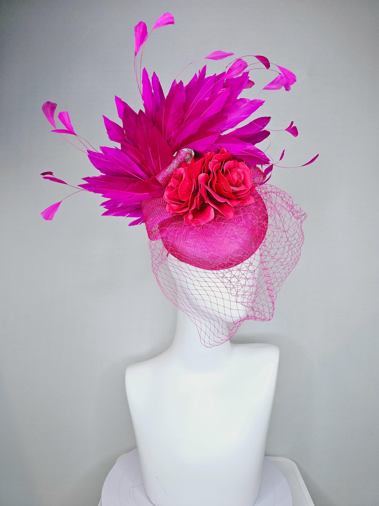 kentucky derby hat fascinator bright pink sinamay with sinamay bow and raspberry pink satin roses fuchsia pink feathers and pink mesh veil