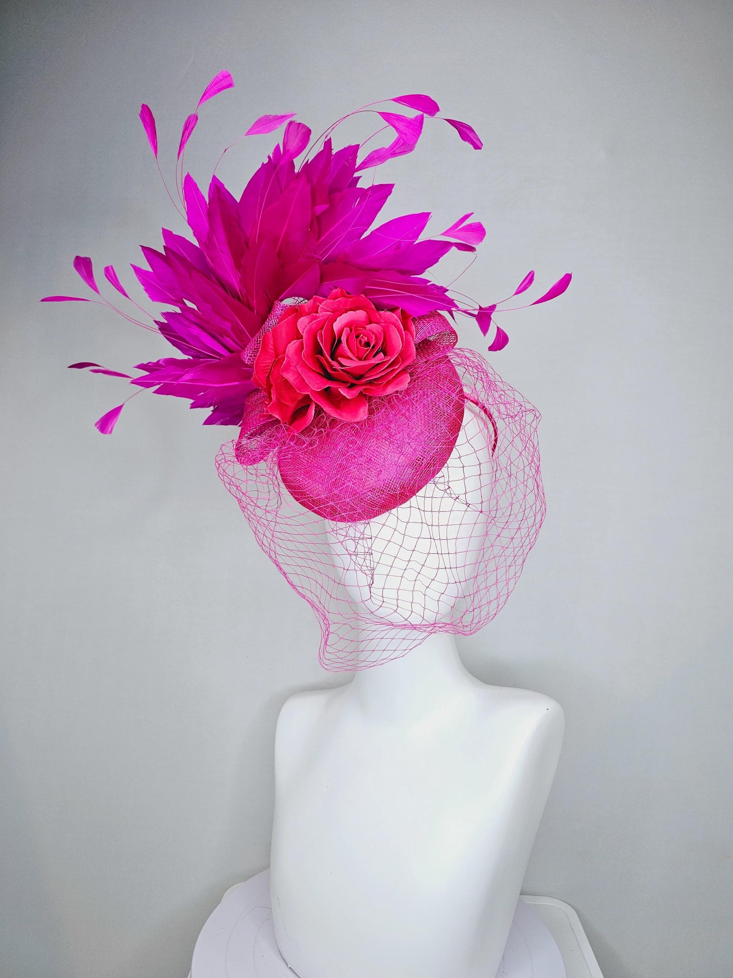 kentucky derby hat fascinator bright pink sinamay with sinamay bow and raspberry pink satin roses fuchsia pink feathers and pink mesh veil