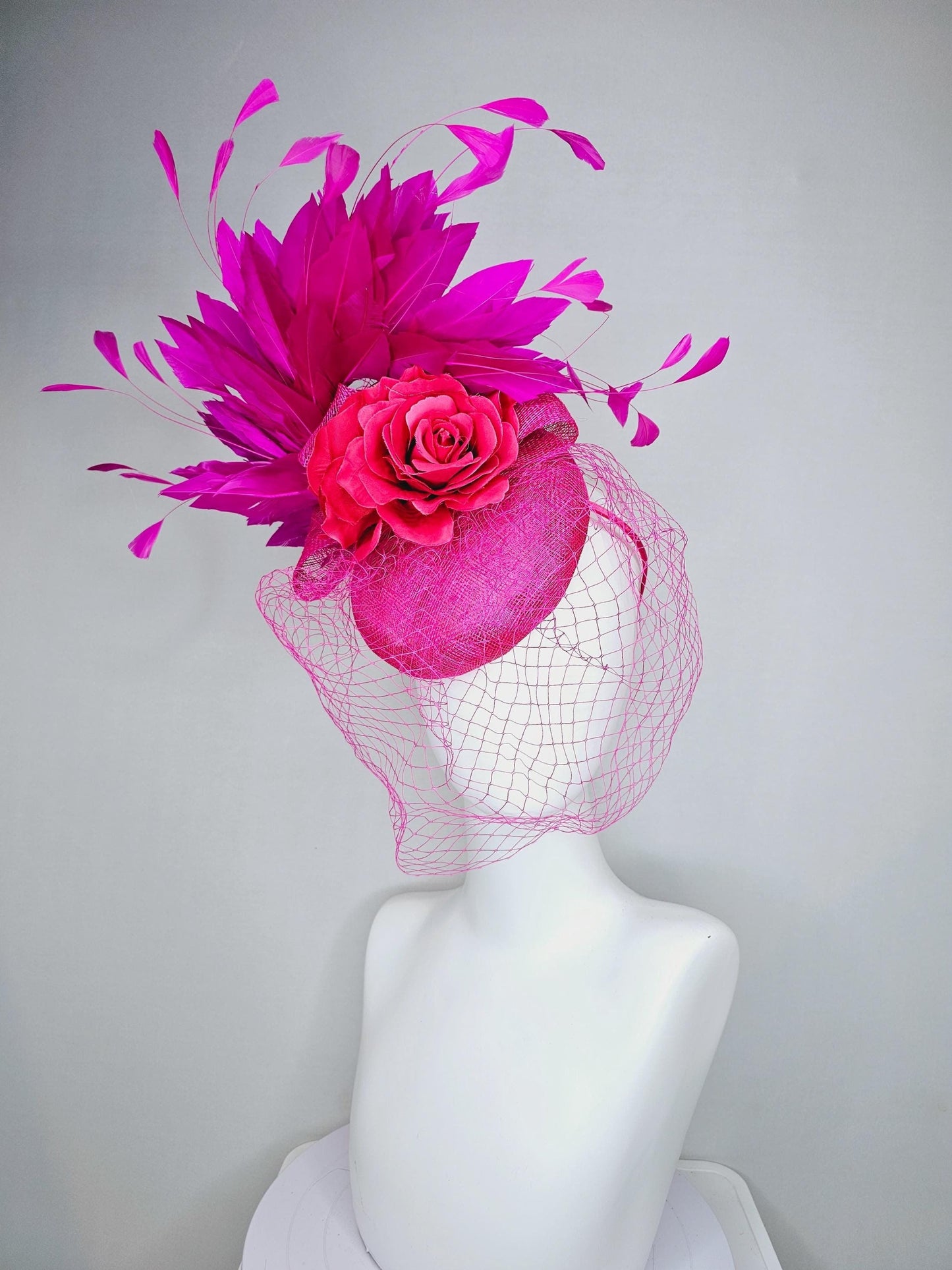 kentucky derby hat fascinator bright pink sinamay with sinamay bow and raspberry pink satin roses fuchsia pink feathers and pink mesh veil