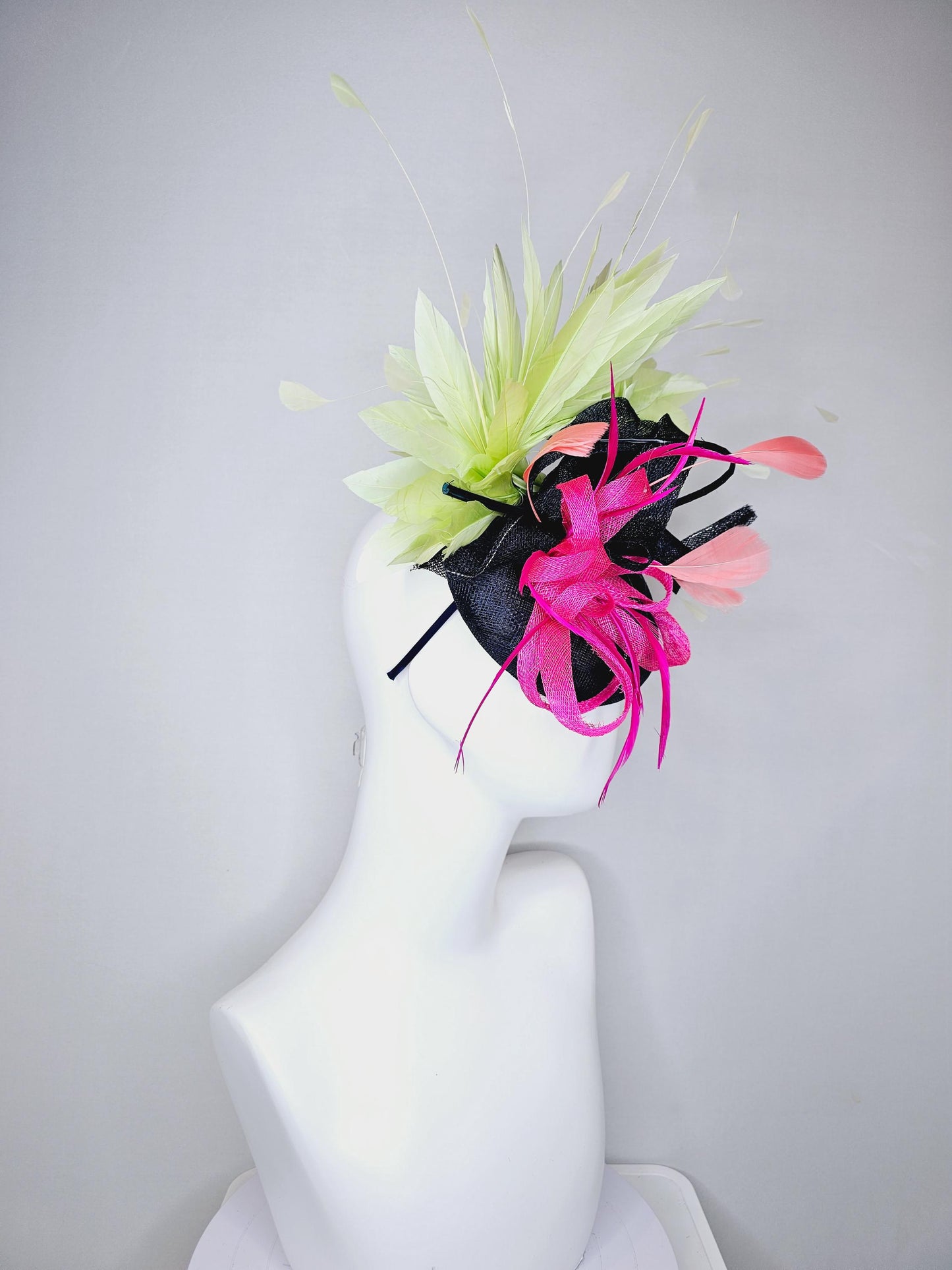 kentucky derby hat fascinator black sinamay with black and pink sinamay curls and pink feathers with light green branching feathers