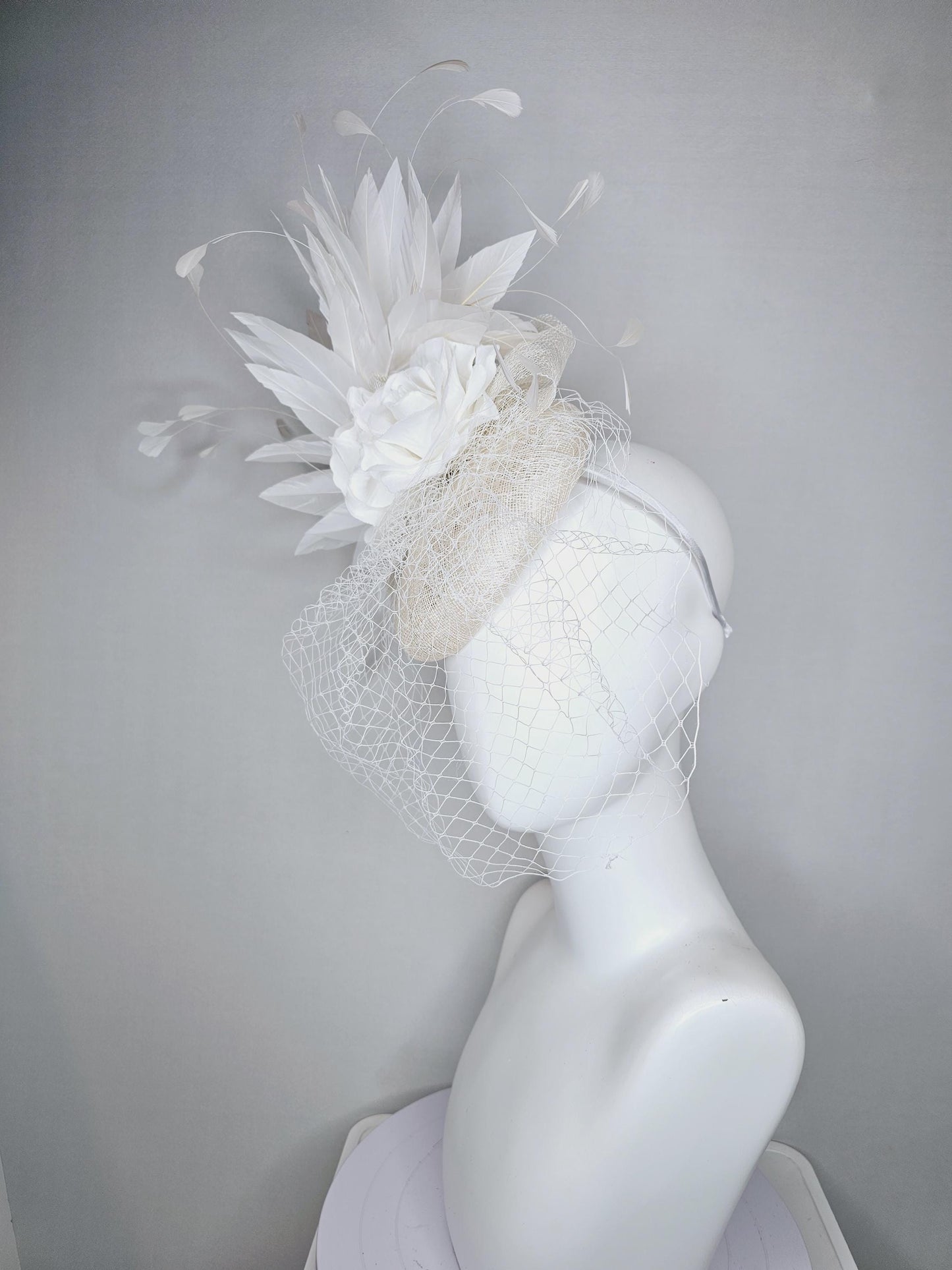 kentucky derby hat fascinator ivory white sinamay with sinamay bow and white satin roses white branching feathers with white mesh veil