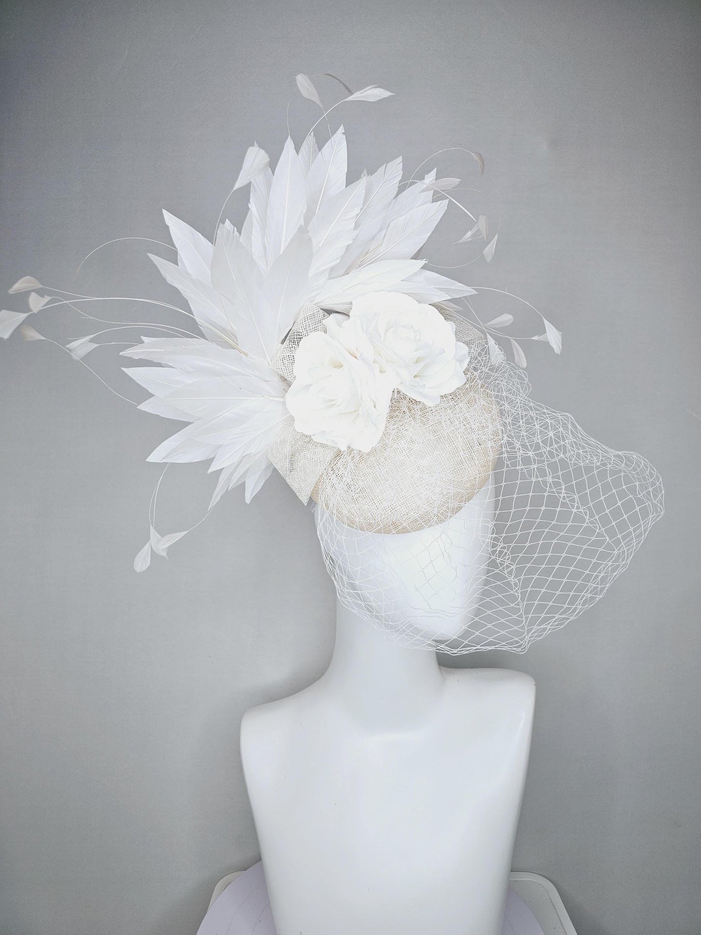 kentucky derby hat fascinator ivory white sinamay with sinamay bow and white satin roses white branching feathers with white mesh veil