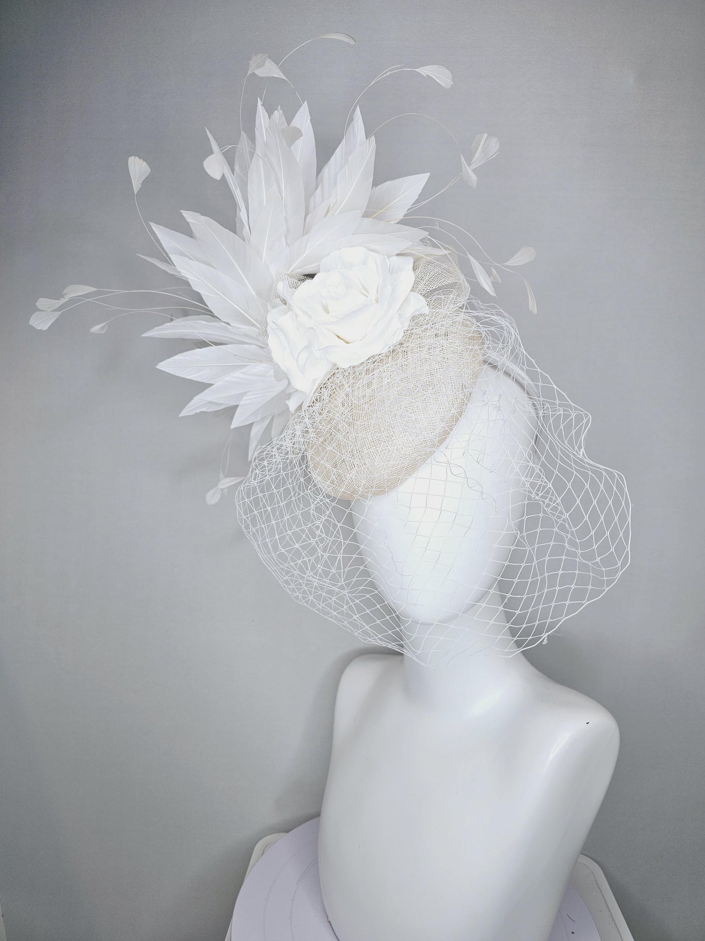kentucky derby hat fascinator ivory white sinamay with sinamay bow and white satin roses white branching feathers with white mesh veil