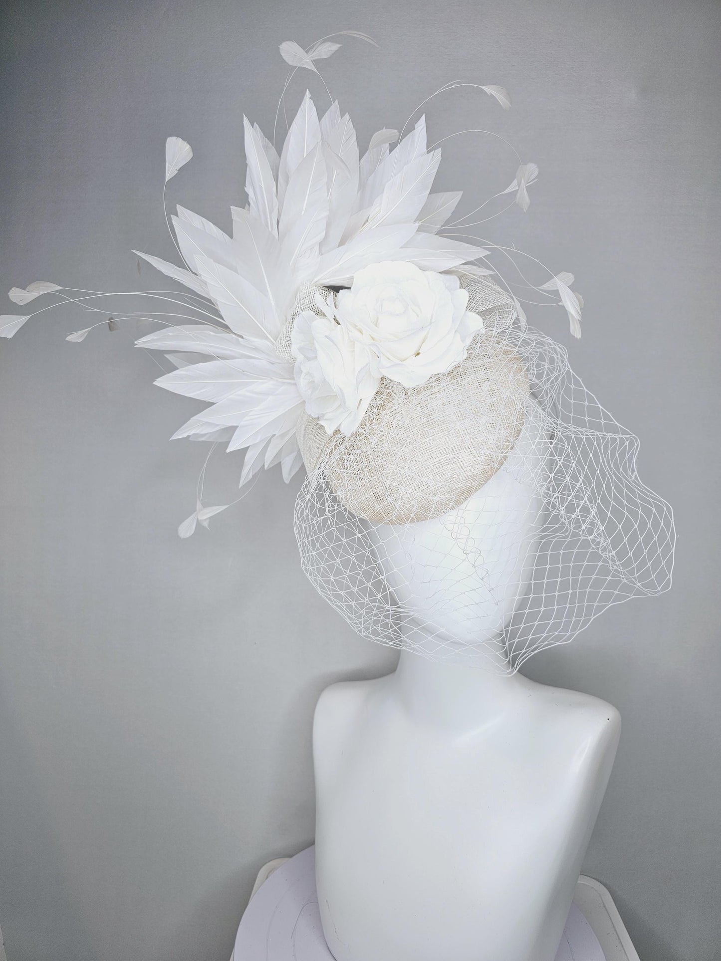 kentucky derby hat fascinator ivory white sinamay with sinamay bow and white satin roses white branching feathers with white mesh veil