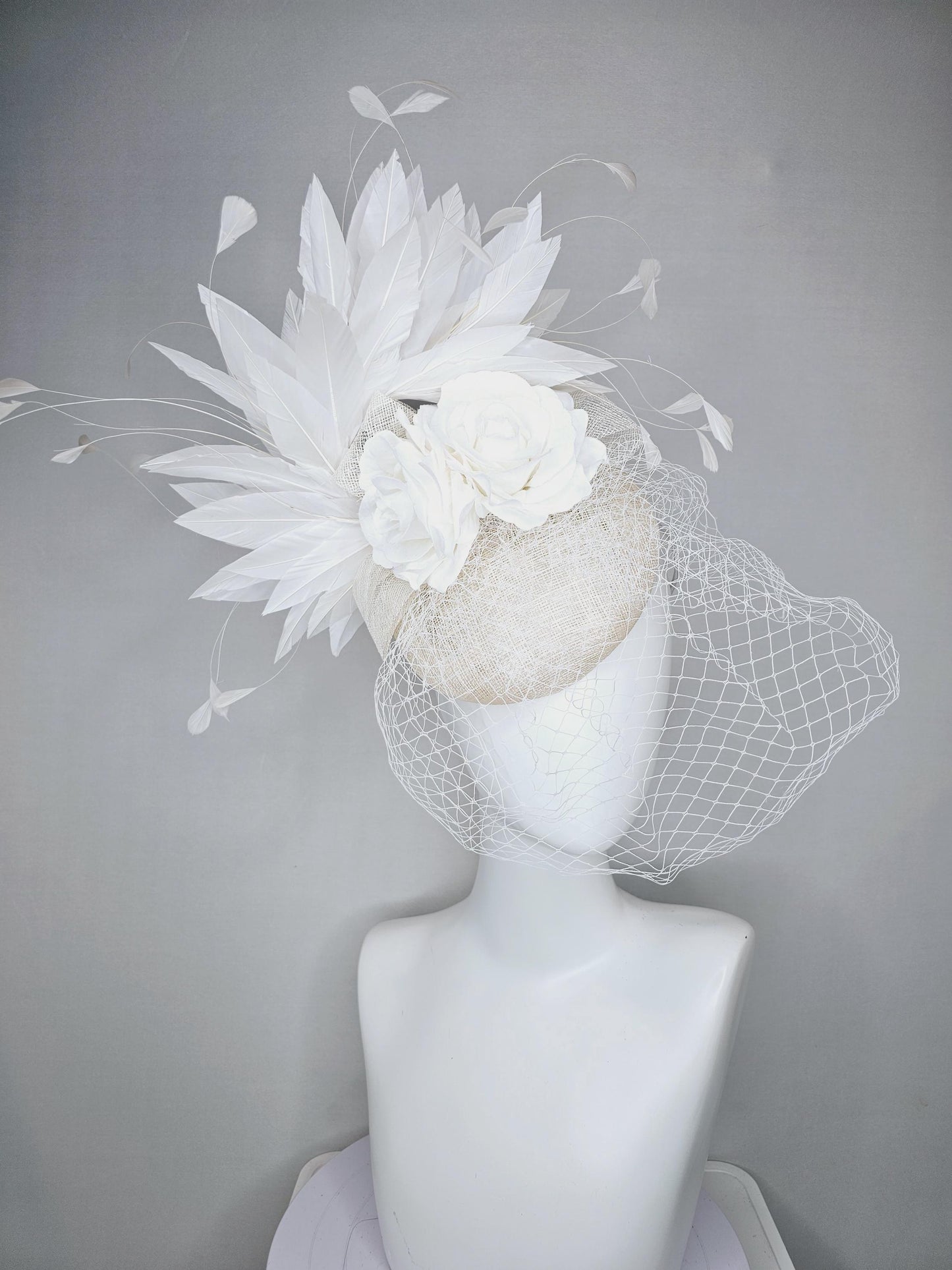 kentucky derby hat fascinator ivory white sinamay with sinamay bow and white satin roses white branching feathers with white mesh veil