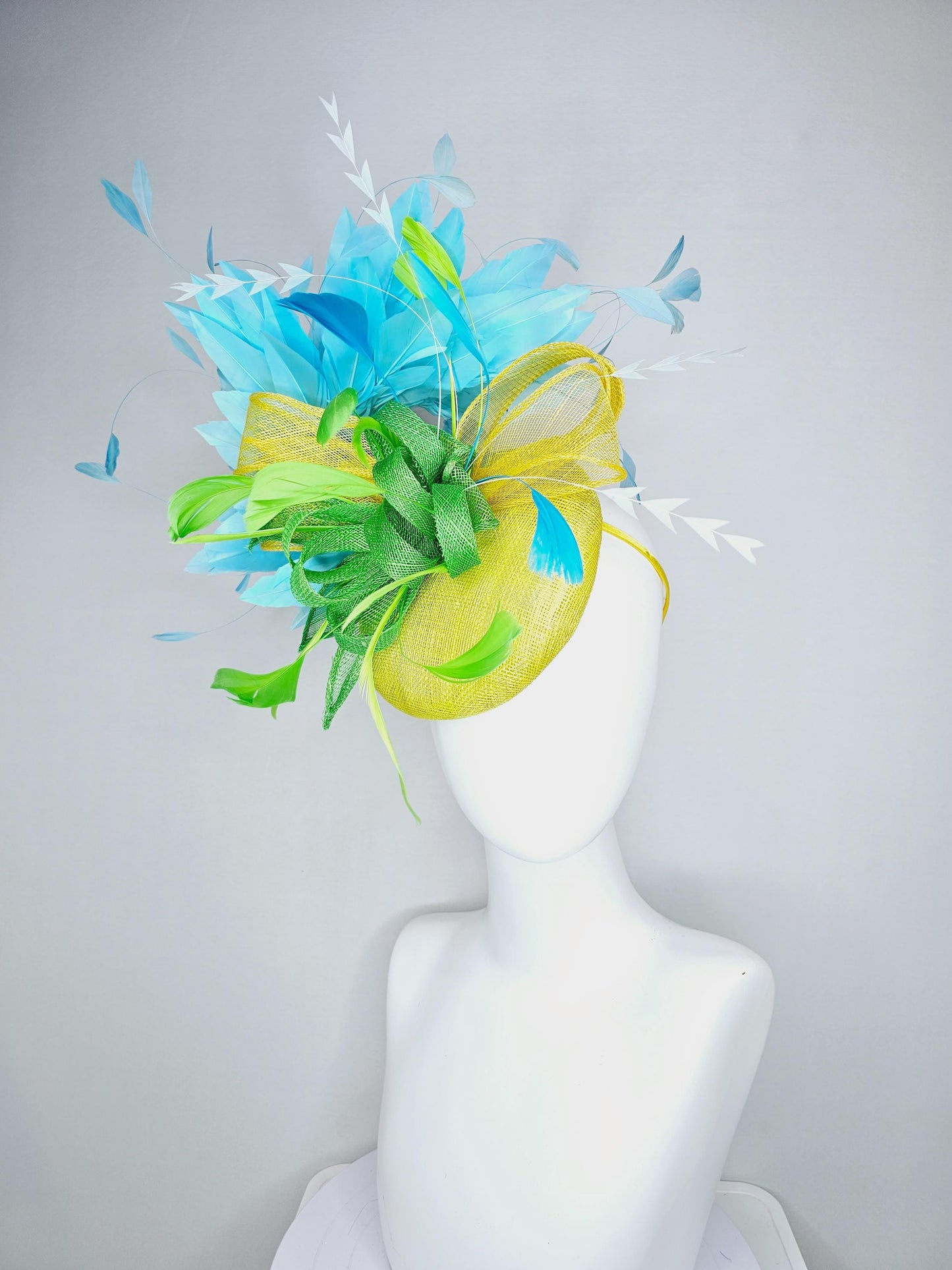 kentucky derby hat fascinator yellow sinamay with yellow and lime green sinamay bow white cut feathers and sky blue branching feathers