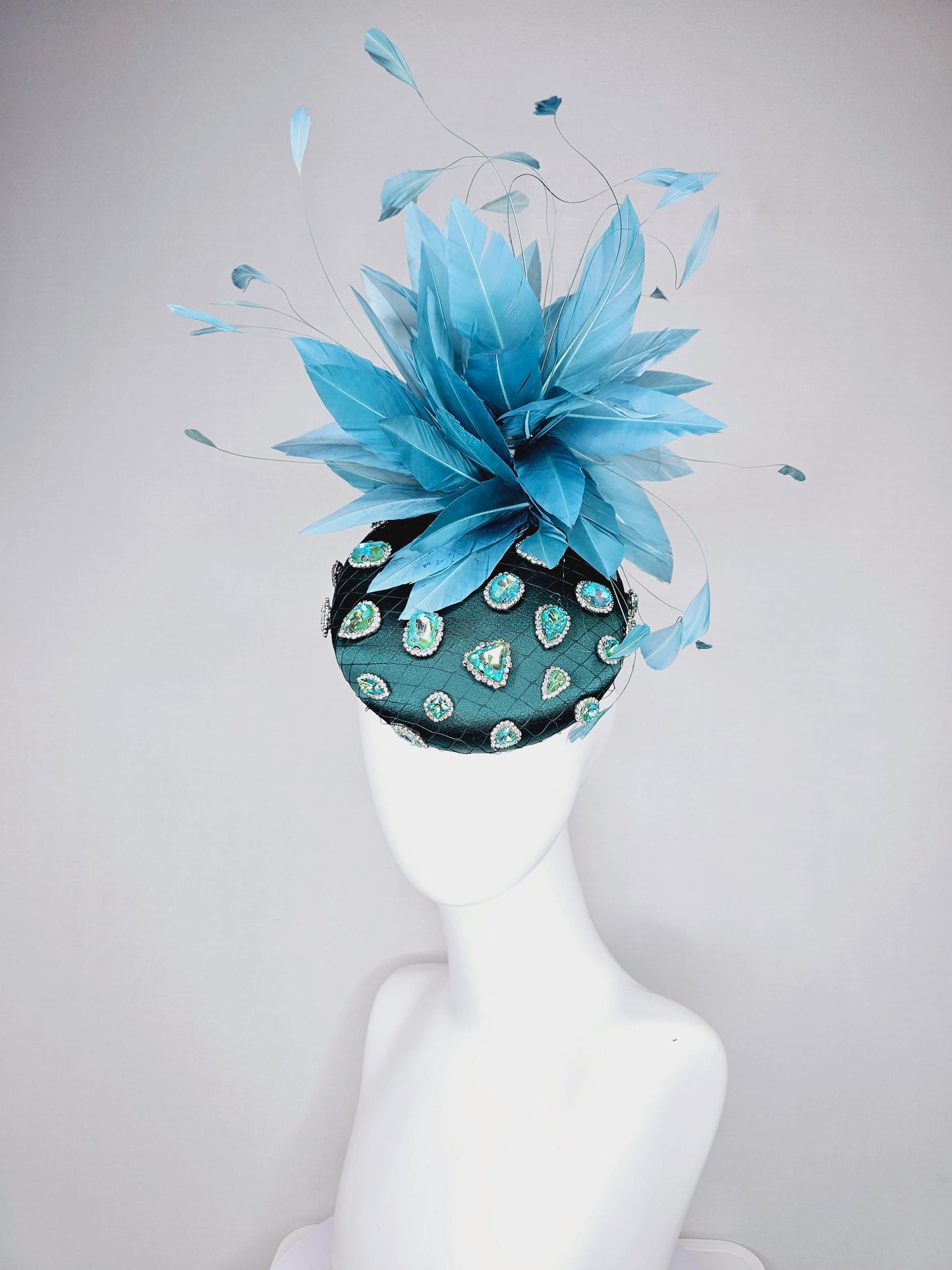 kentucky derby hat fascinator dark green satin with netting and green iridescent crystal rhinestone beaded fluffy peacock teal blue feathers