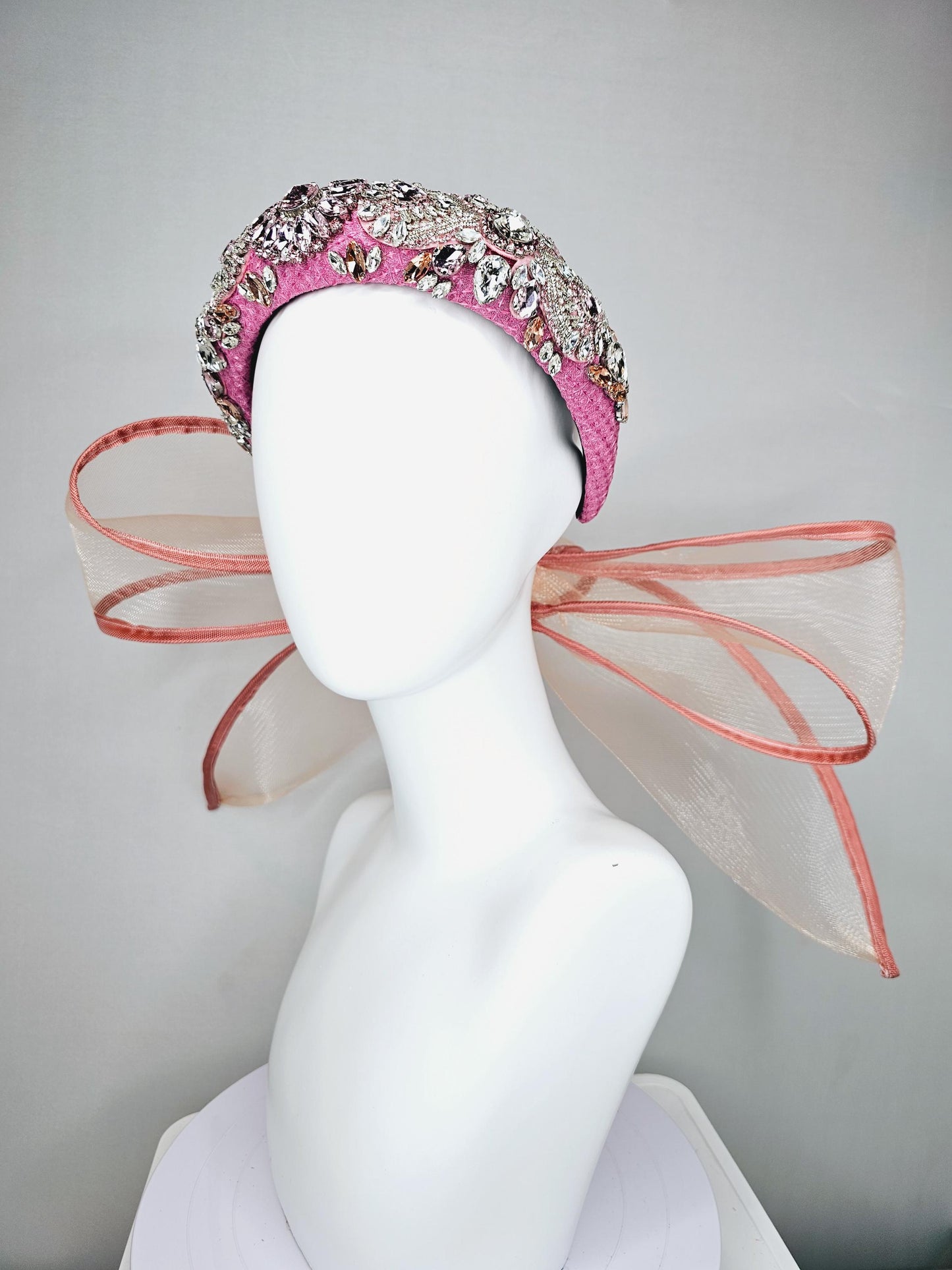 kentucky derby hat fascinator pink headband with iridescent pink tones crystal rhinestone encrusted jewels large dusty blush pink mesh bow