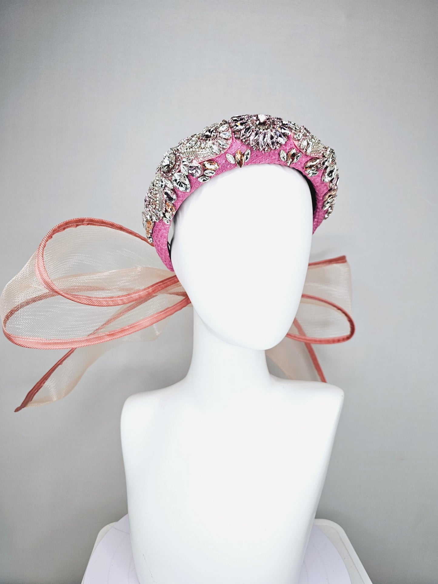 kentucky derby hat fascinator pink headband with iridescent pink tones crystal rhinestone encrusted jewels large dusty blush pink mesh bow