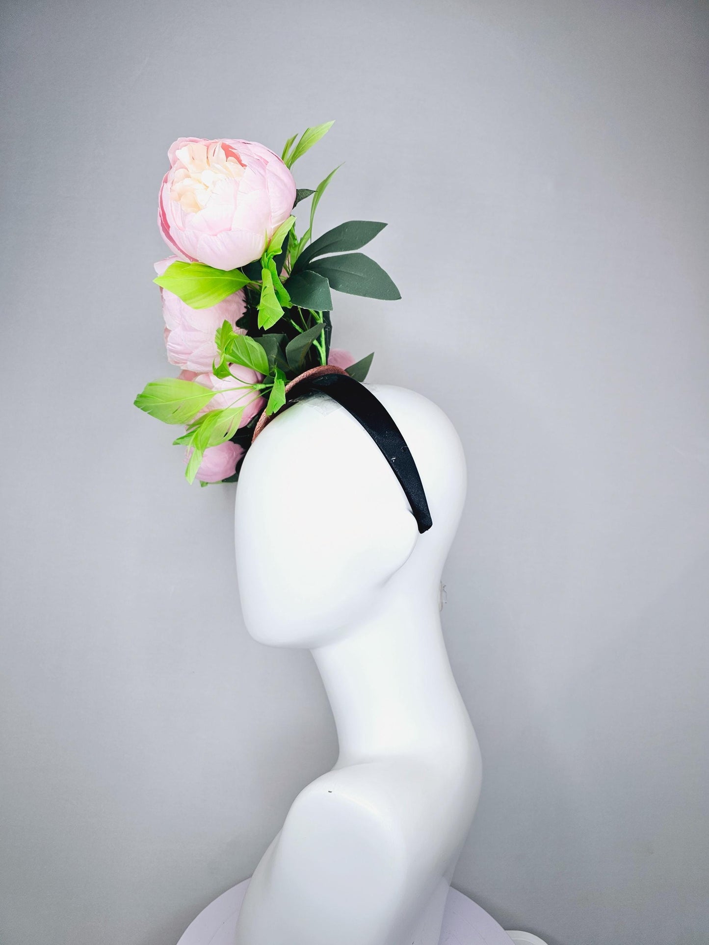 kentucky derby hat fascinator large blush pink flowers with green branching feathers large headpiece
