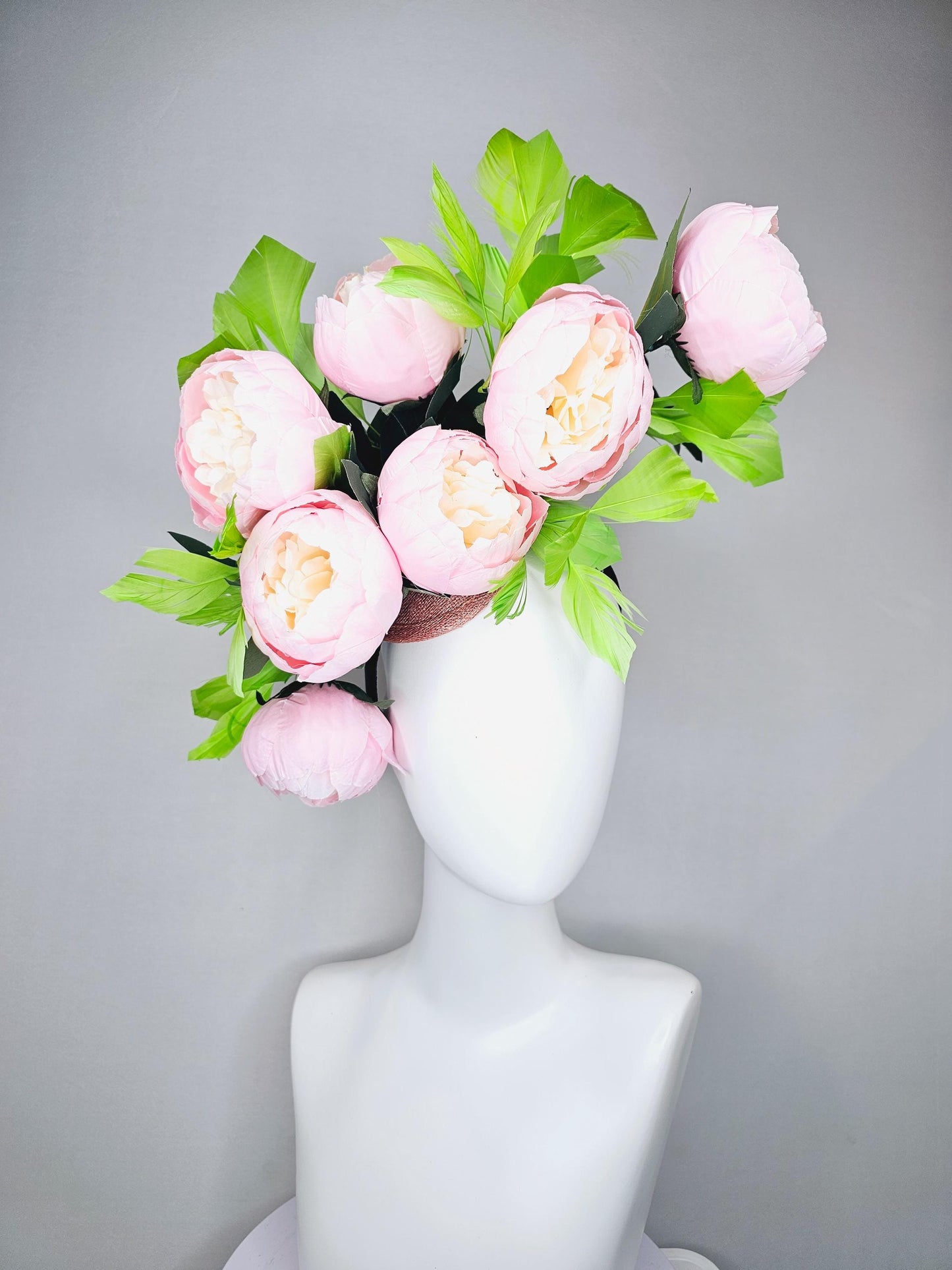 kentucky derby hat fascinator large blush pink flowers with green branching feathers large headpiece