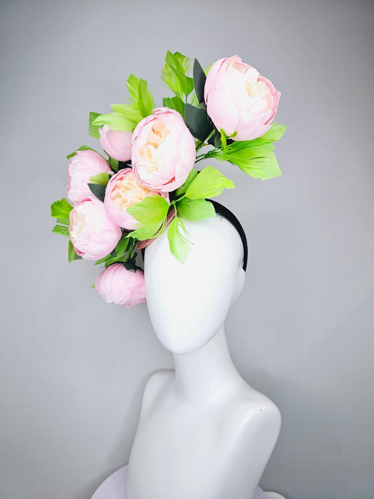 kentucky derby hat fascinator large blush pink flowers with green branching feathers large headpiece