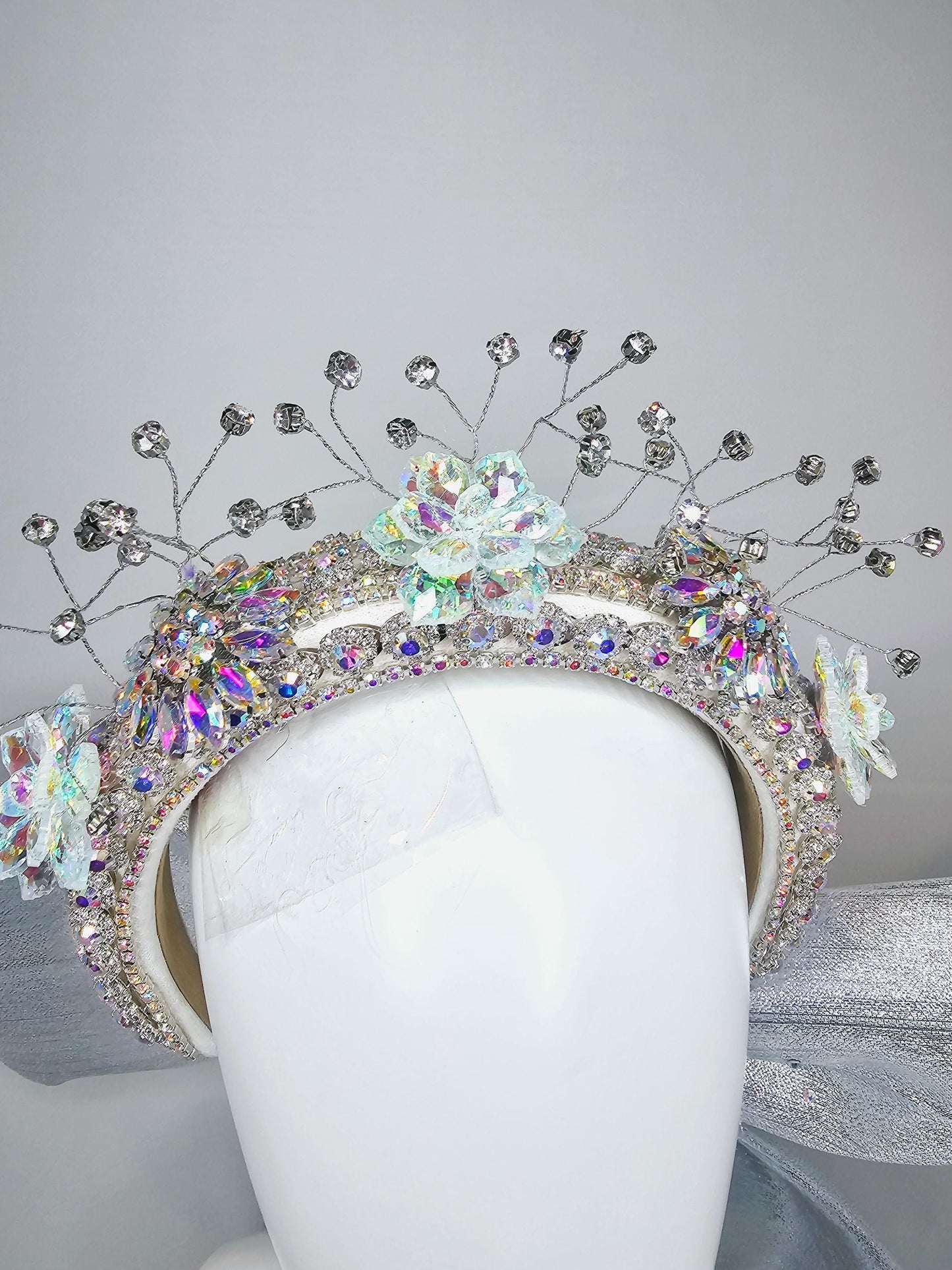 kentucky derby hat large thick crystal rhinestone tiara encrusted headband with huge silver padded ribbon bow decor along back with crystals