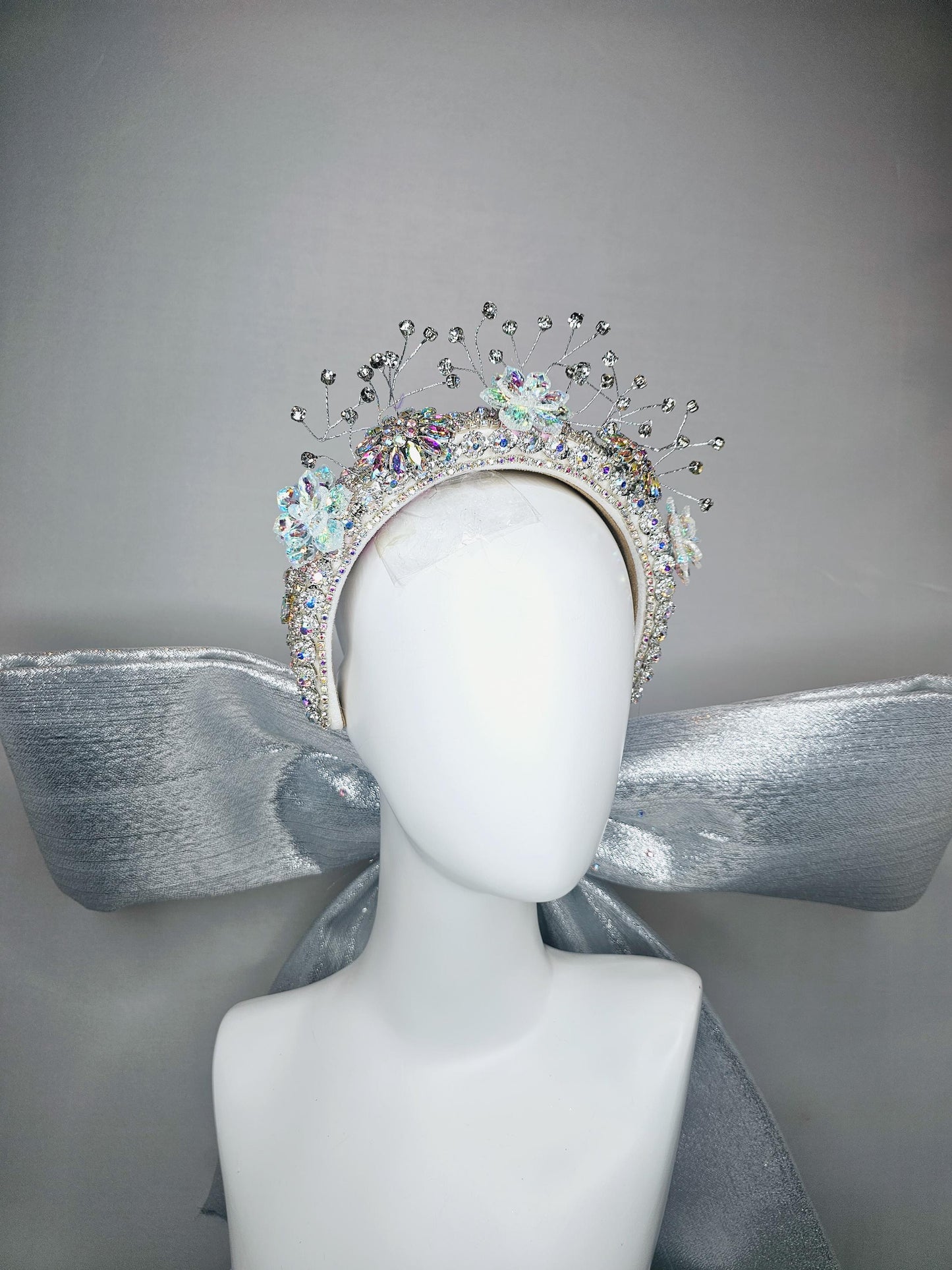 kentucky derby hat large thick crystal rhinestone tiara encrusted headband with huge silver padded ribbon bow decor along back with crystals