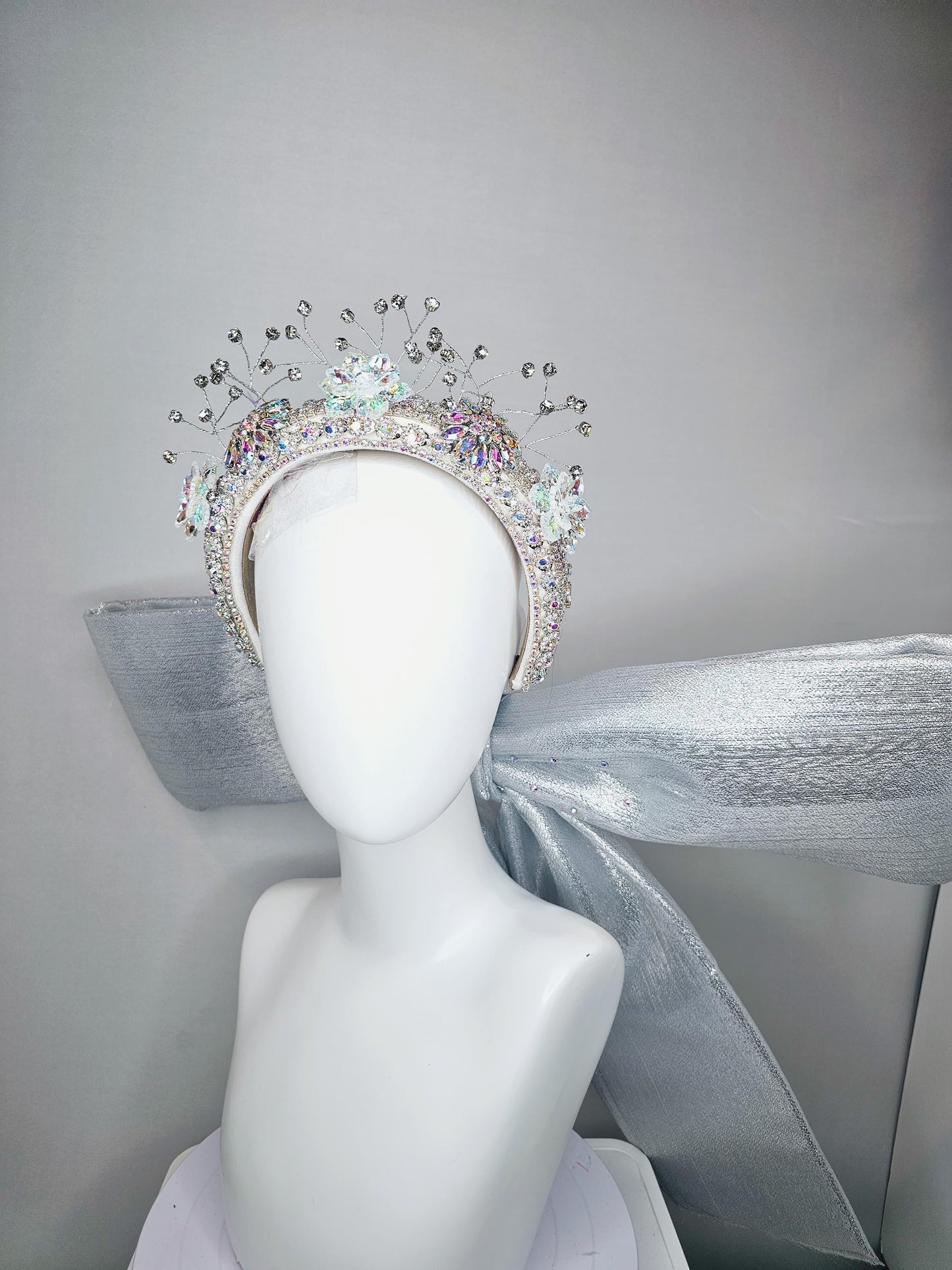 kentucky derby hat large thick crystal rhinestone tiara encrusted headband with huge silver padded ribbon bow decor along back with crystals