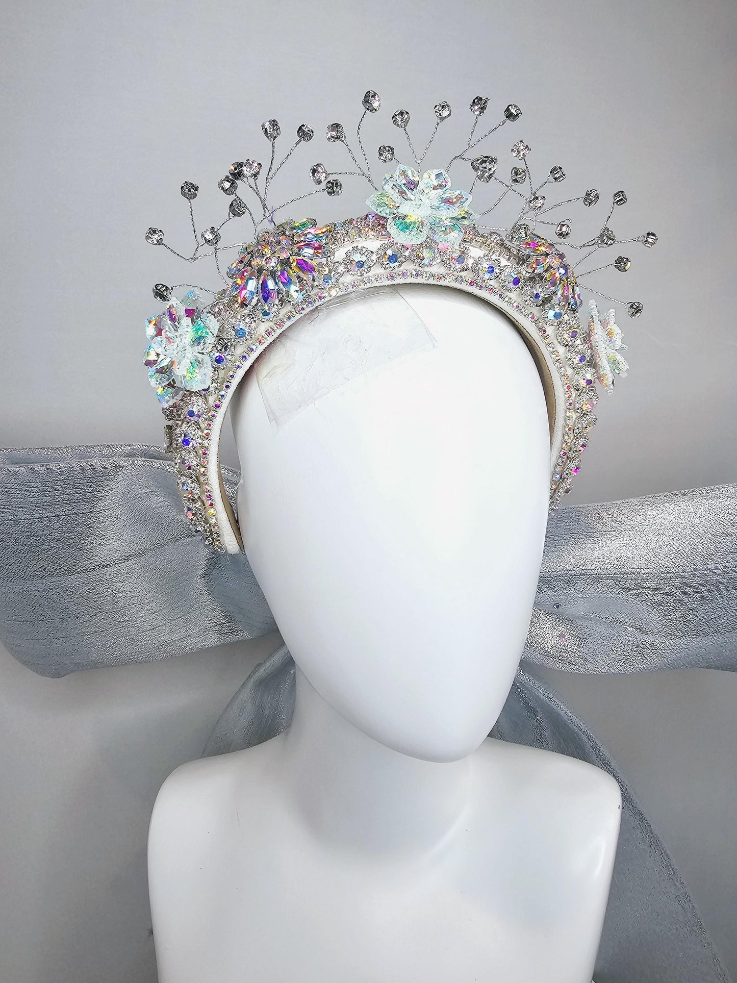 kentucky derby hat large thick crystal rhinestone tiara encrusted headband with huge silver padded ribbon bow decor along back with crystals
