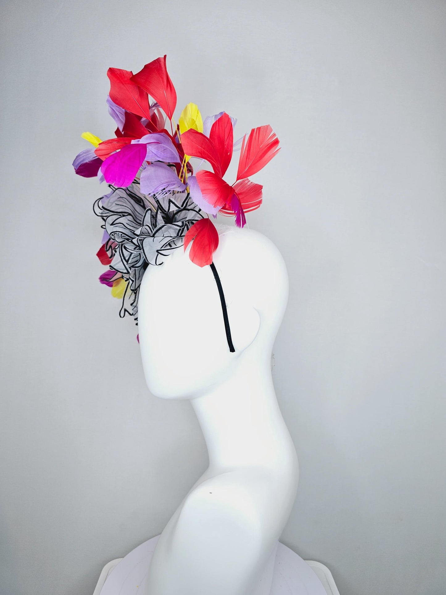 kentucky derby hat fascinator purple violet red and yellow feathers with large chiffon black and white flowers