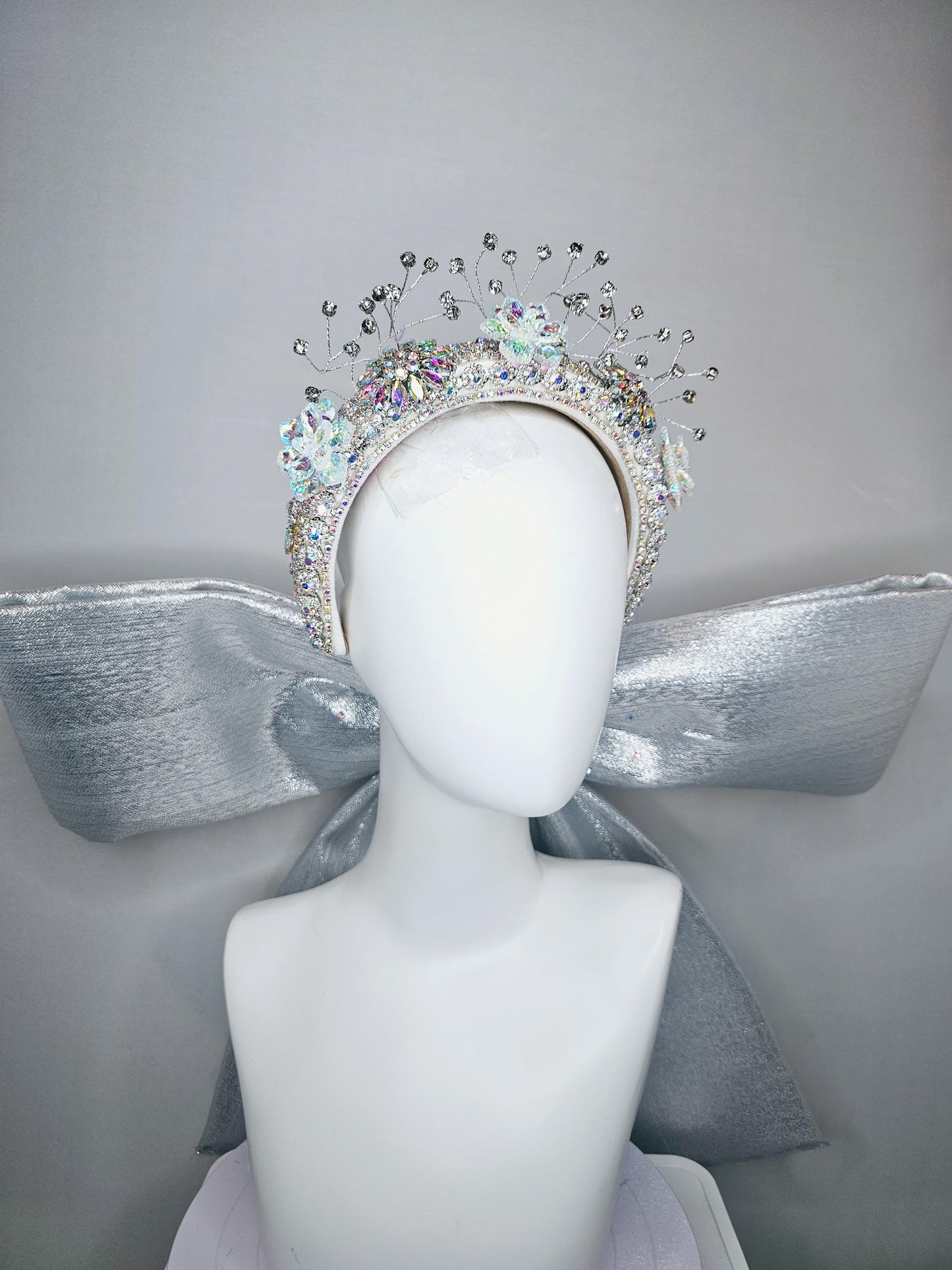 kentucky derby hat large thick crystal rhinestone tiara encrusted headband with huge silver padded ribbon bow decor along back with crystals