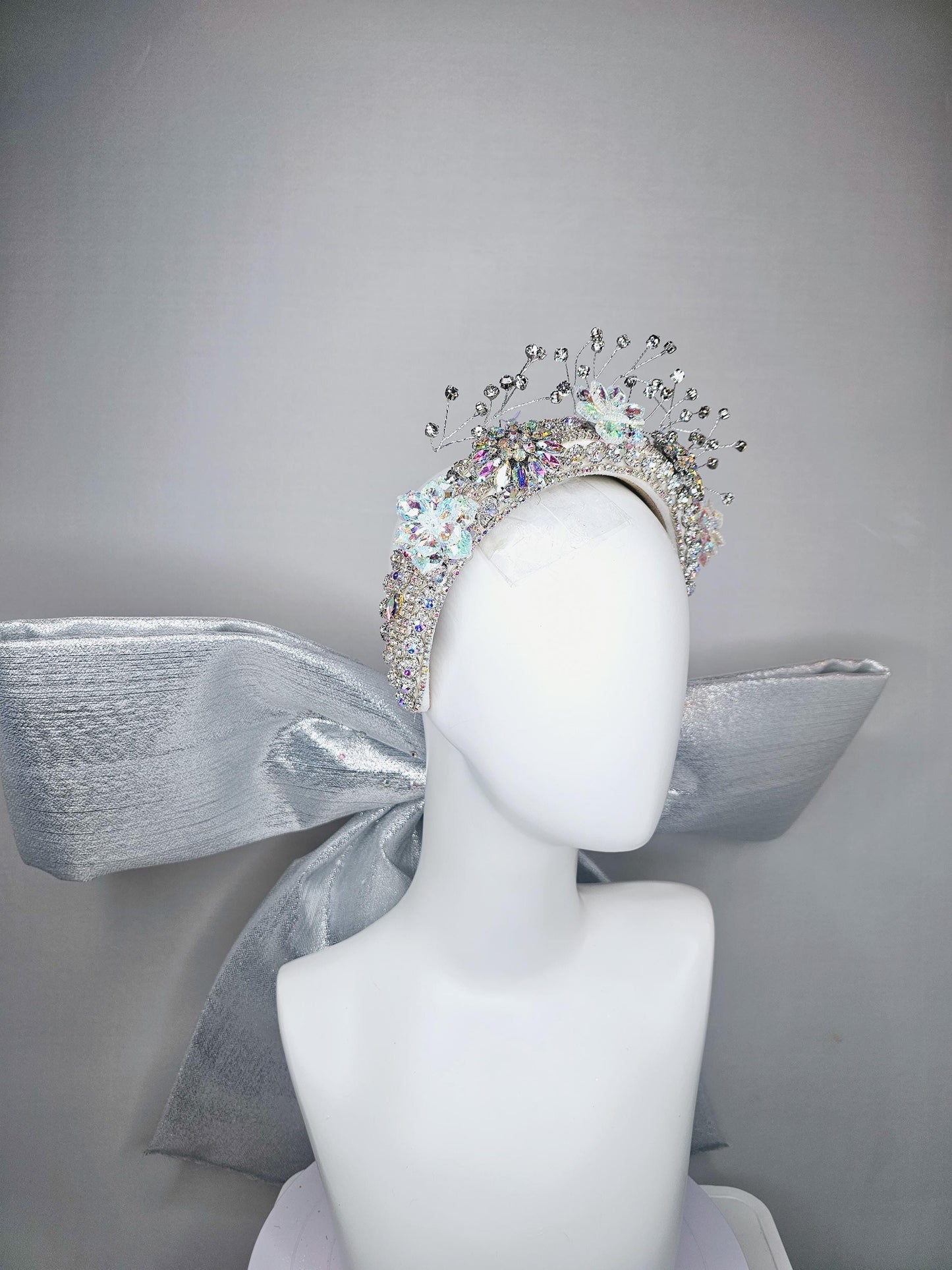 kentucky derby hat large thick crystal rhinestone tiara encrusted headband with huge silver padded ribbon bow decor along back with crystals