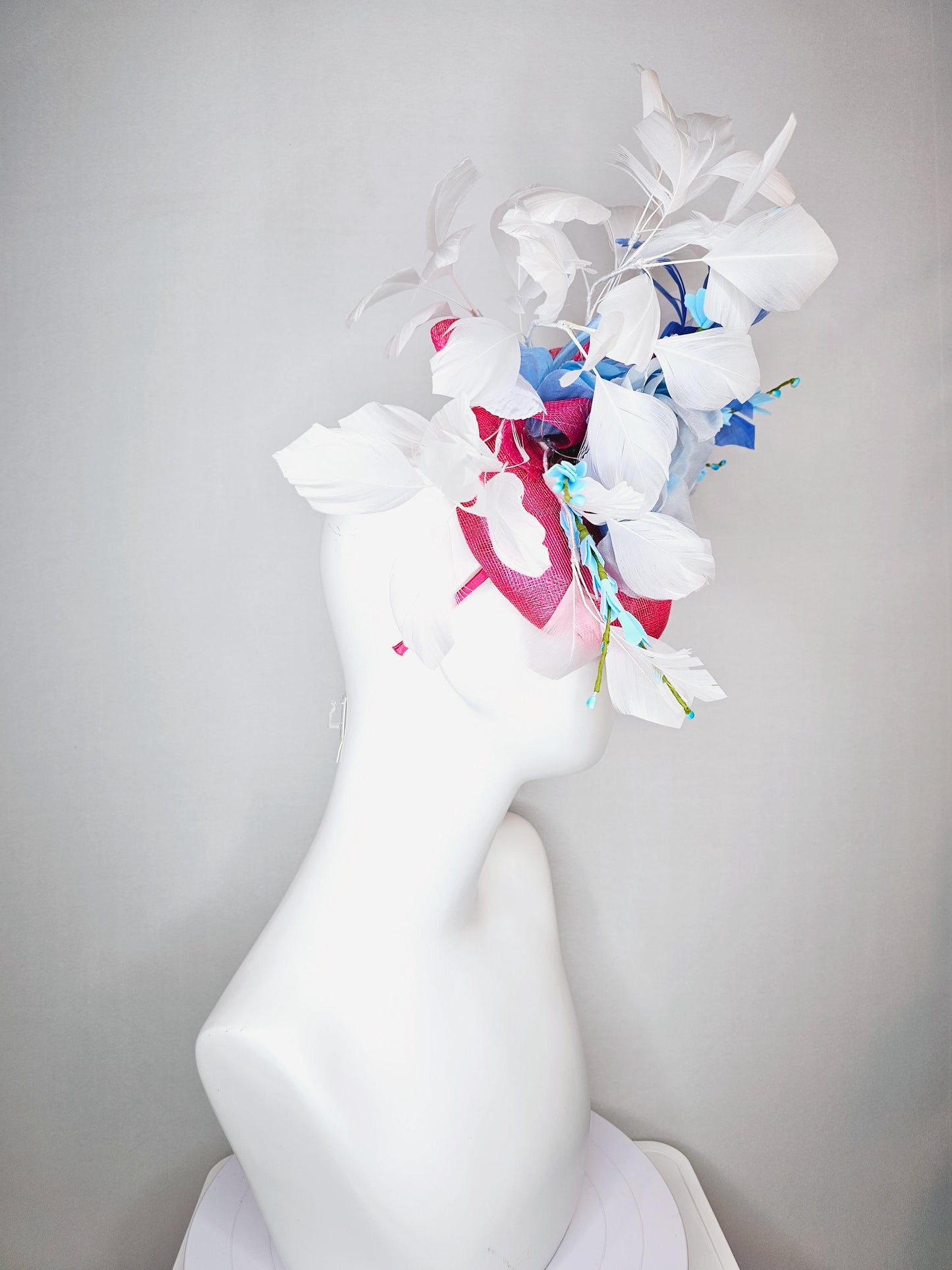 kentucky derby hat fascinator raspberry pink sinamay with sinamay bows and ombre blue organza rose flower and white and royal blue feathers