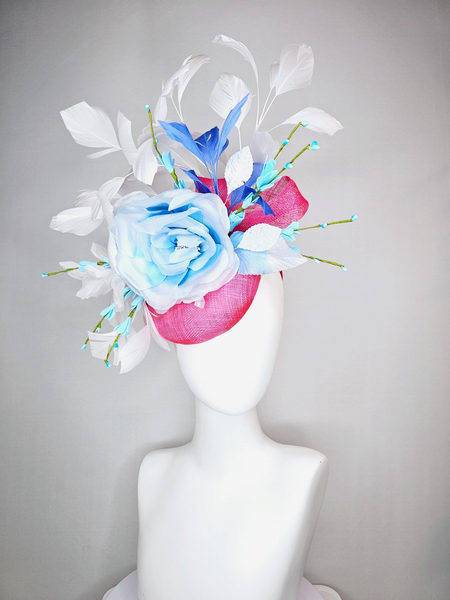 kentucky derby hat fascinator raspberry pink sinamay with sinamay bows and ombre blue organza rose flower and white and royal blue feathers