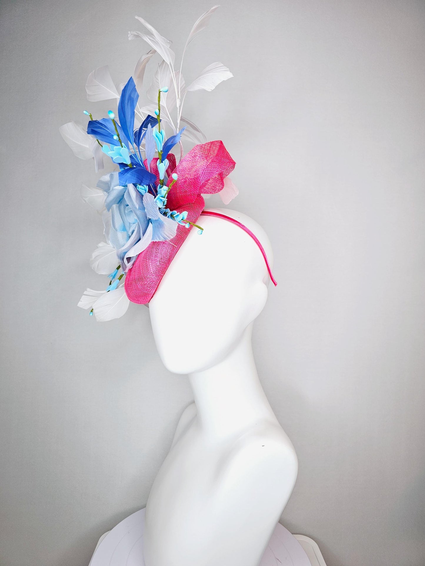 kentucky derby hat fascinator raspberry pink sinamay with sinamay bows and ombre blue organza rose flower and white and royal blue feathers