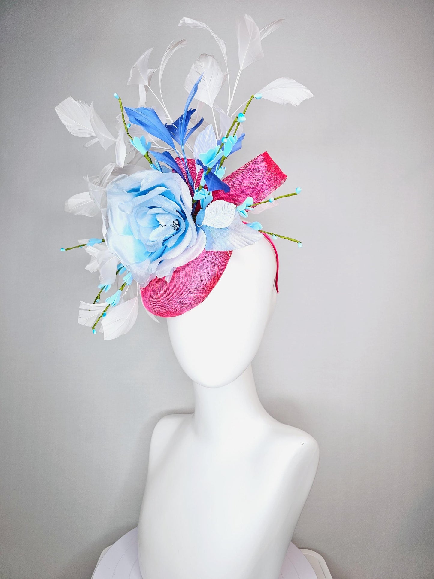 kentucky derby hat fascinator raspberry pink sinamay with sinamay bows and ombre blue organza rose flower and white and royal blue feathers