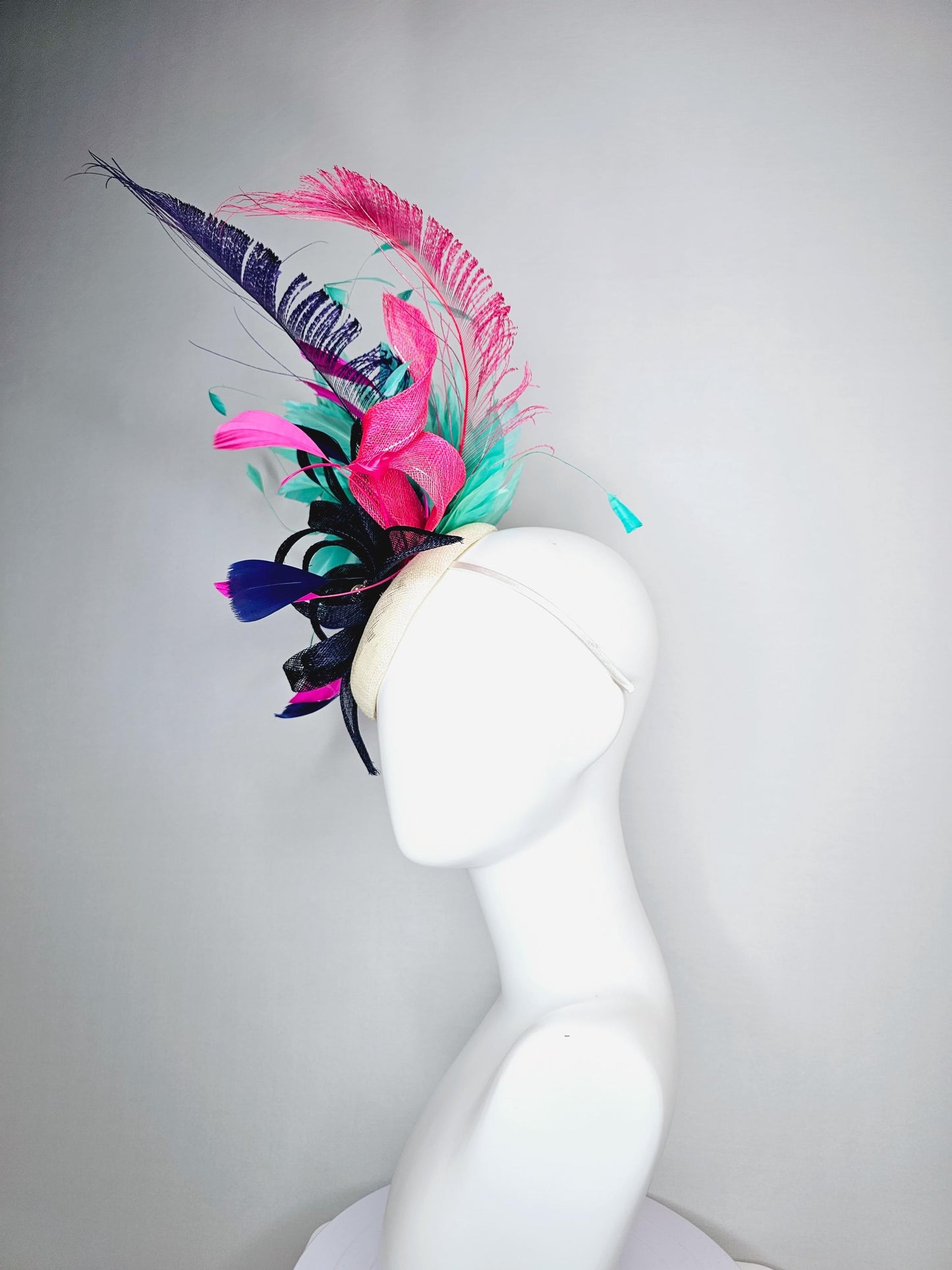 kentucky derby hat fascinator ivory white sinamay with navy blue raspberry pink sinamay flower and aqua green branching feathers
