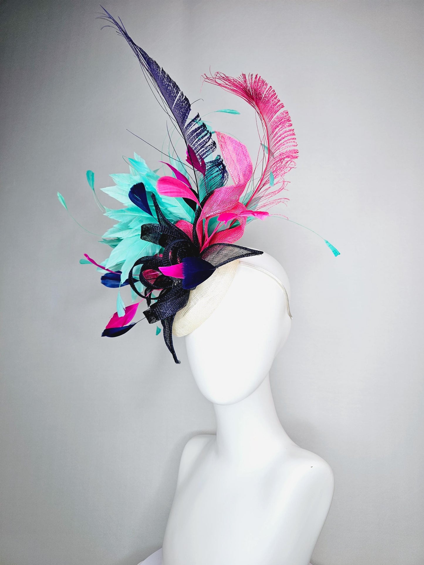 kentucky derby hat fascinator ivory white sinamay with navy blue raspberry pink sinamay flower and aqua green branching feathers