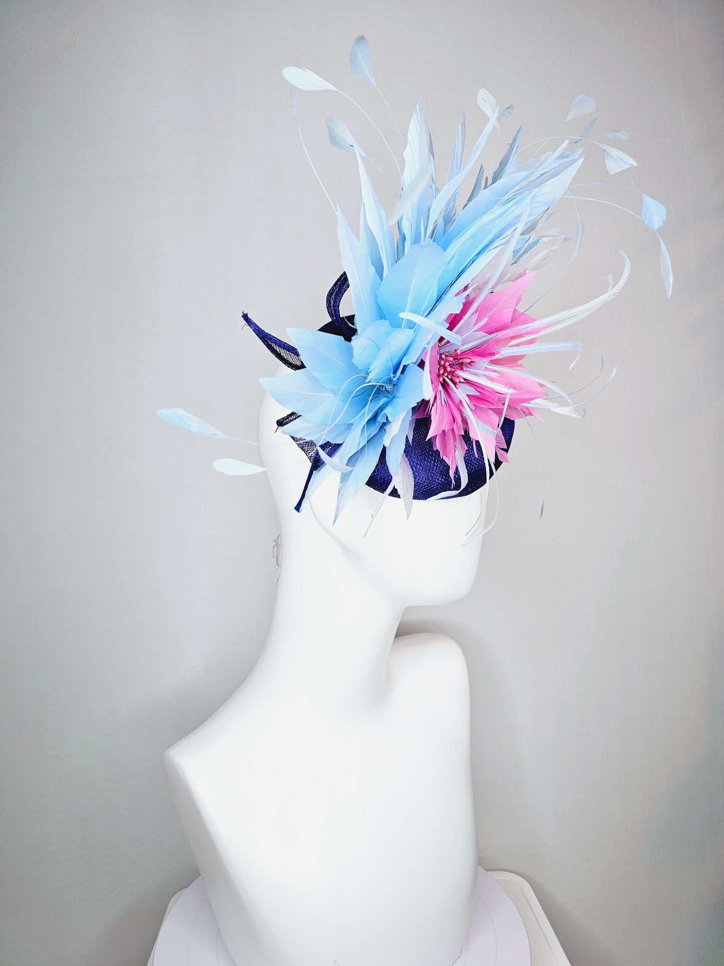 kentucky derby hat fascinator royal blue sinamay with blush pink feather flower and white leaves light baby blue branching feathers