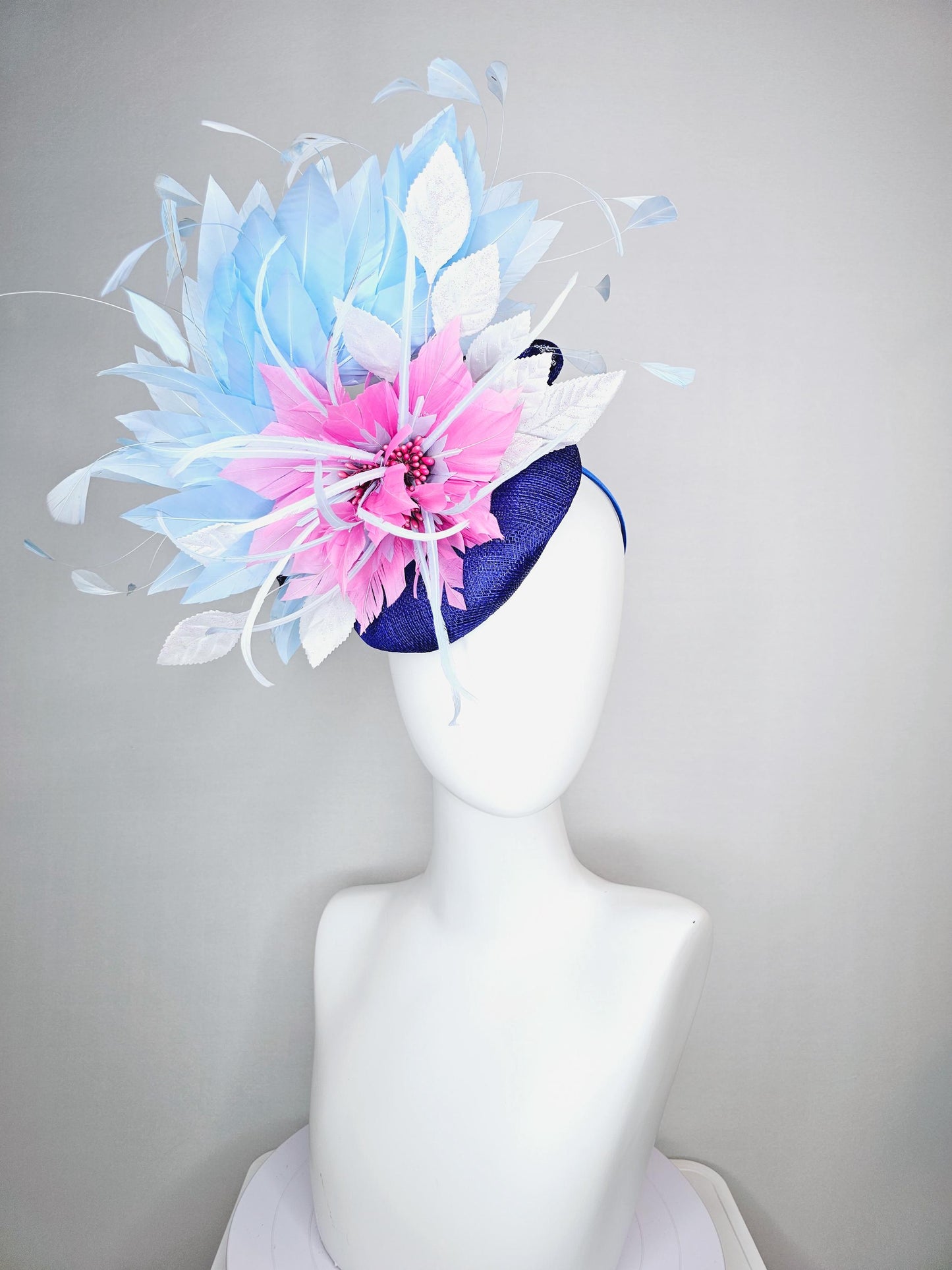 kentucky derby hat fascinator royal blue sinamay with blush pink feather flower and white leaves light baby blue branching feathers