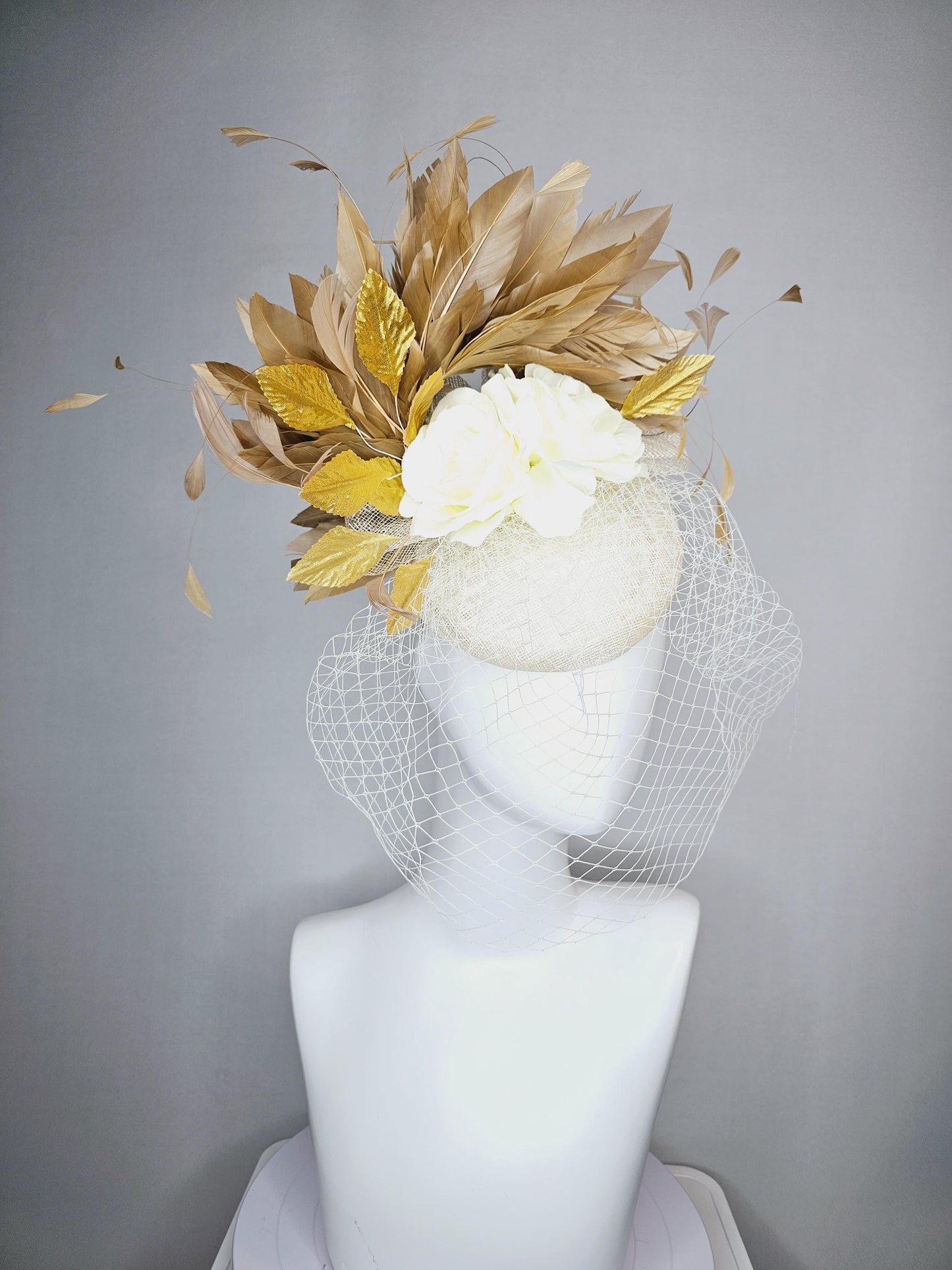 kentucky derby hat fascinator white sinamay with white netting off white silk roses gold lame metallic eaves gold beige branching feathers