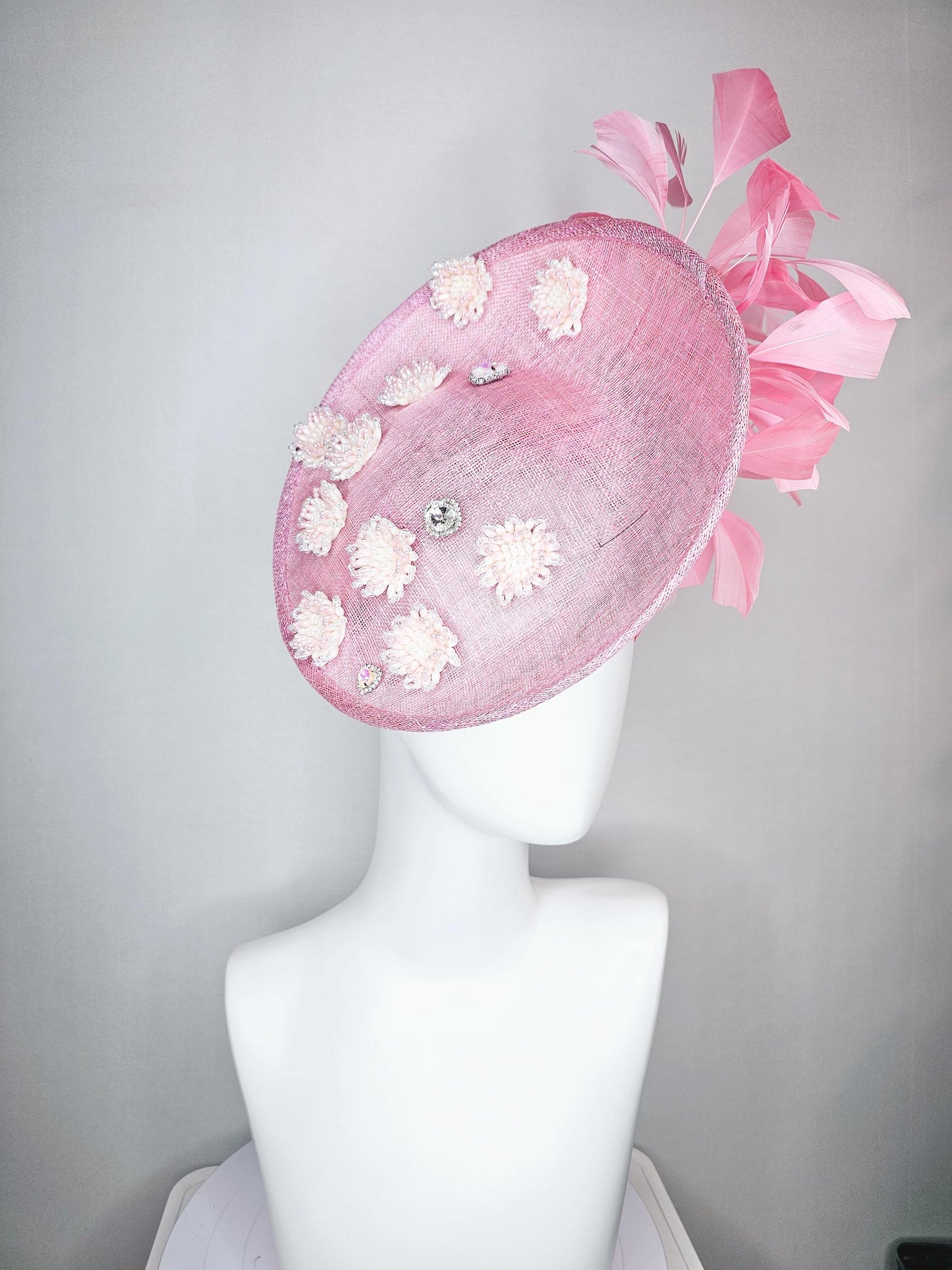 kentucky derby hat fascinator baby pink sinamay saucer with crystal jewel and light pink pearl beaded flowers pink branching feathers