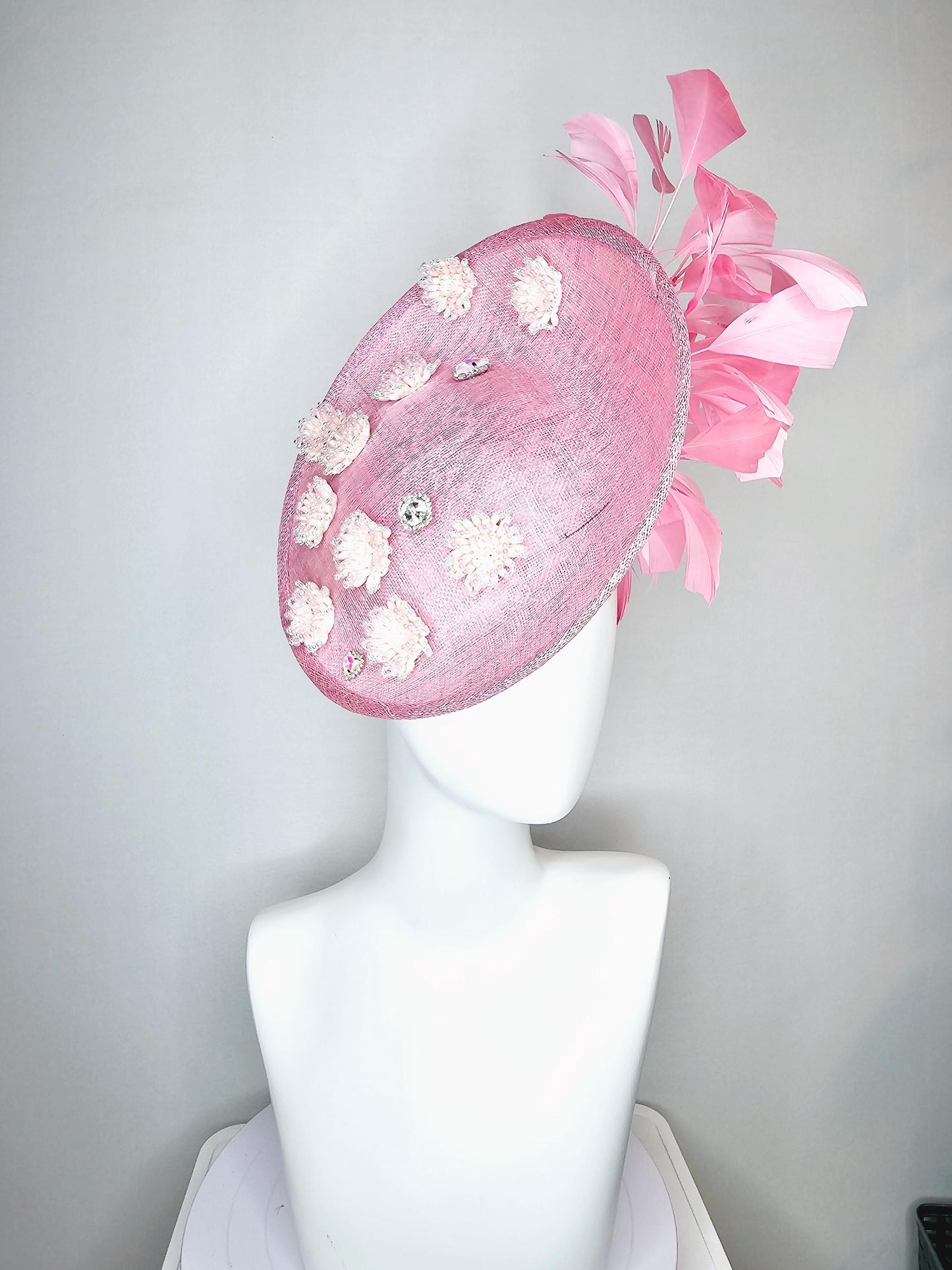 kentucky derby hat fascinator baby pink sinamay saucer with crystal jewel and light pink pearl beaded flowers pink branching feathers