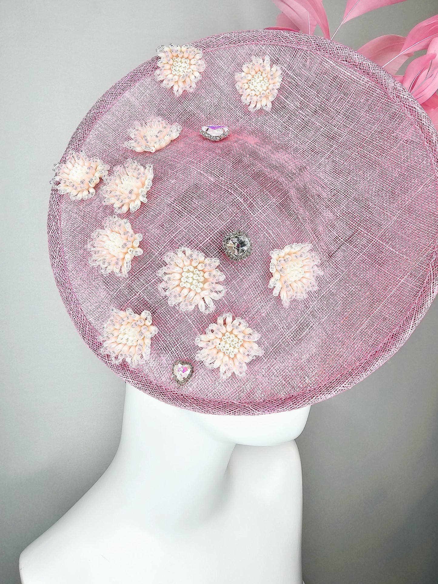 kentucky derby hat fascinator baby pink sinamay saucer with crystal jewel and light pink pearl beaded flowers pink branching feathers