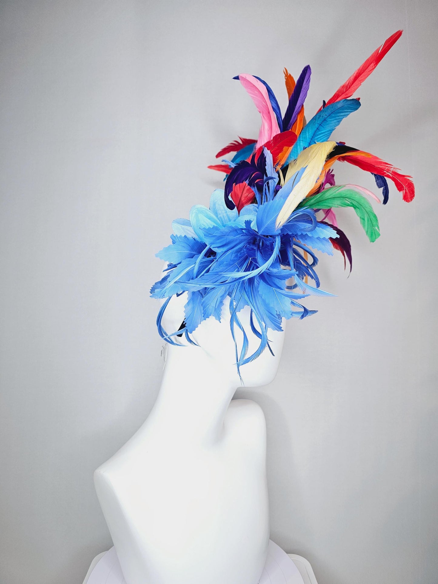 kentucky derby hat fascinator royal blue zigzag feather flower with colorful rainbow red pink purple yellow green branching feathers