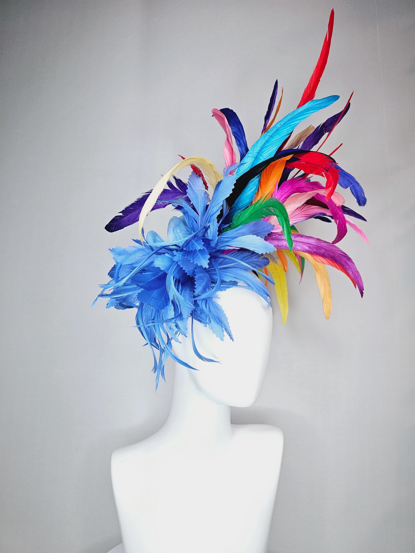 kentucky derby hat fascinator royal blue zigzag feather flower with colorful rainbow red pink purple yellow green branching feathers
