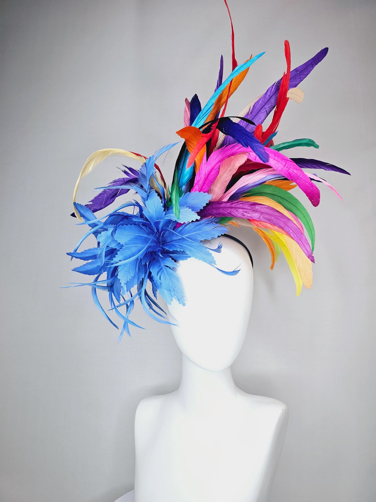 kentucky derby hat fascinator royal blue zigzag feather flower with colorful rainbow red pink purple yellow green branching feathers
