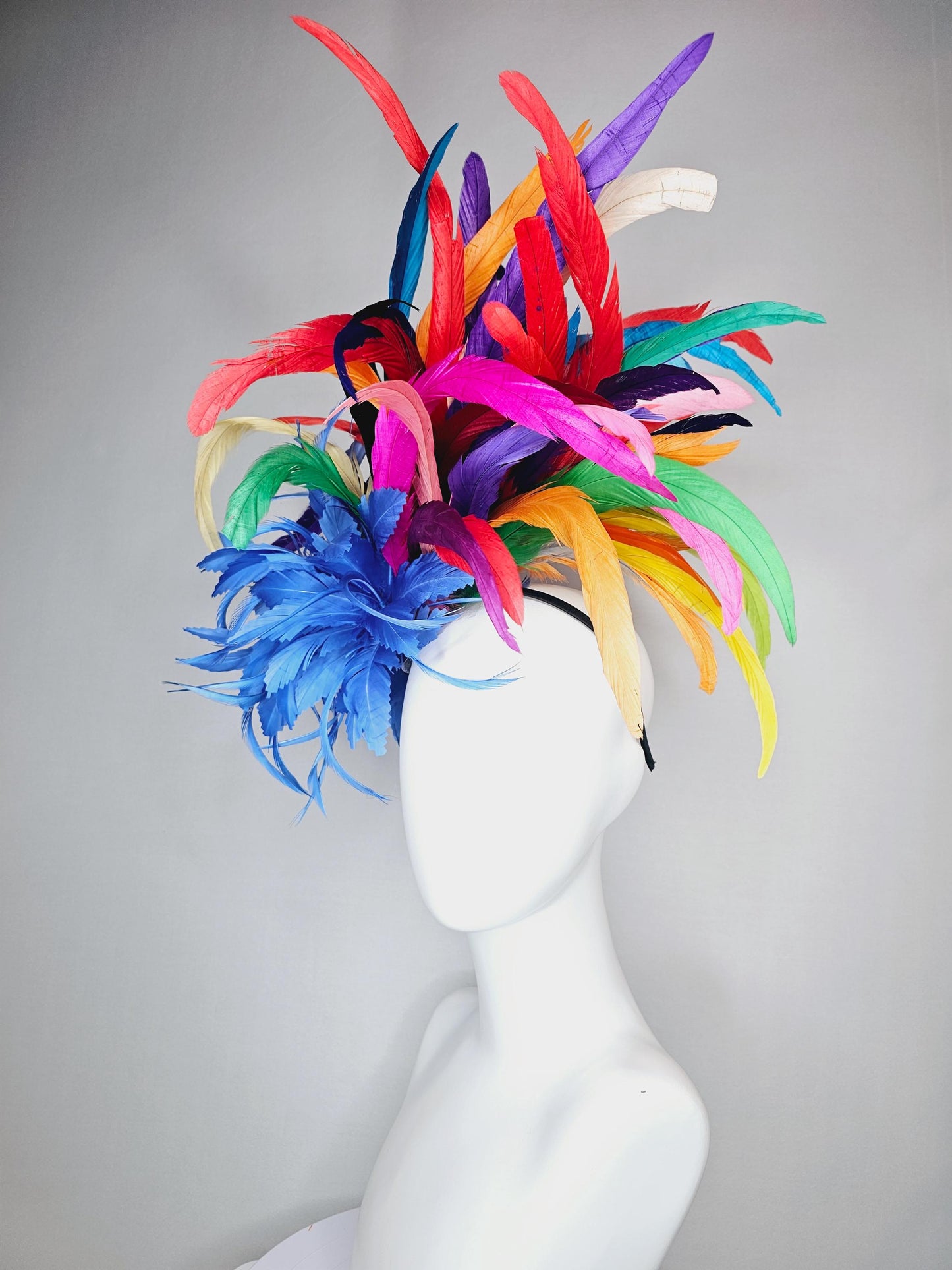 kentucky derby hat fascinator royal blue zigzag feather flower with colorful rainbow red pink purple yellow green branching feathers