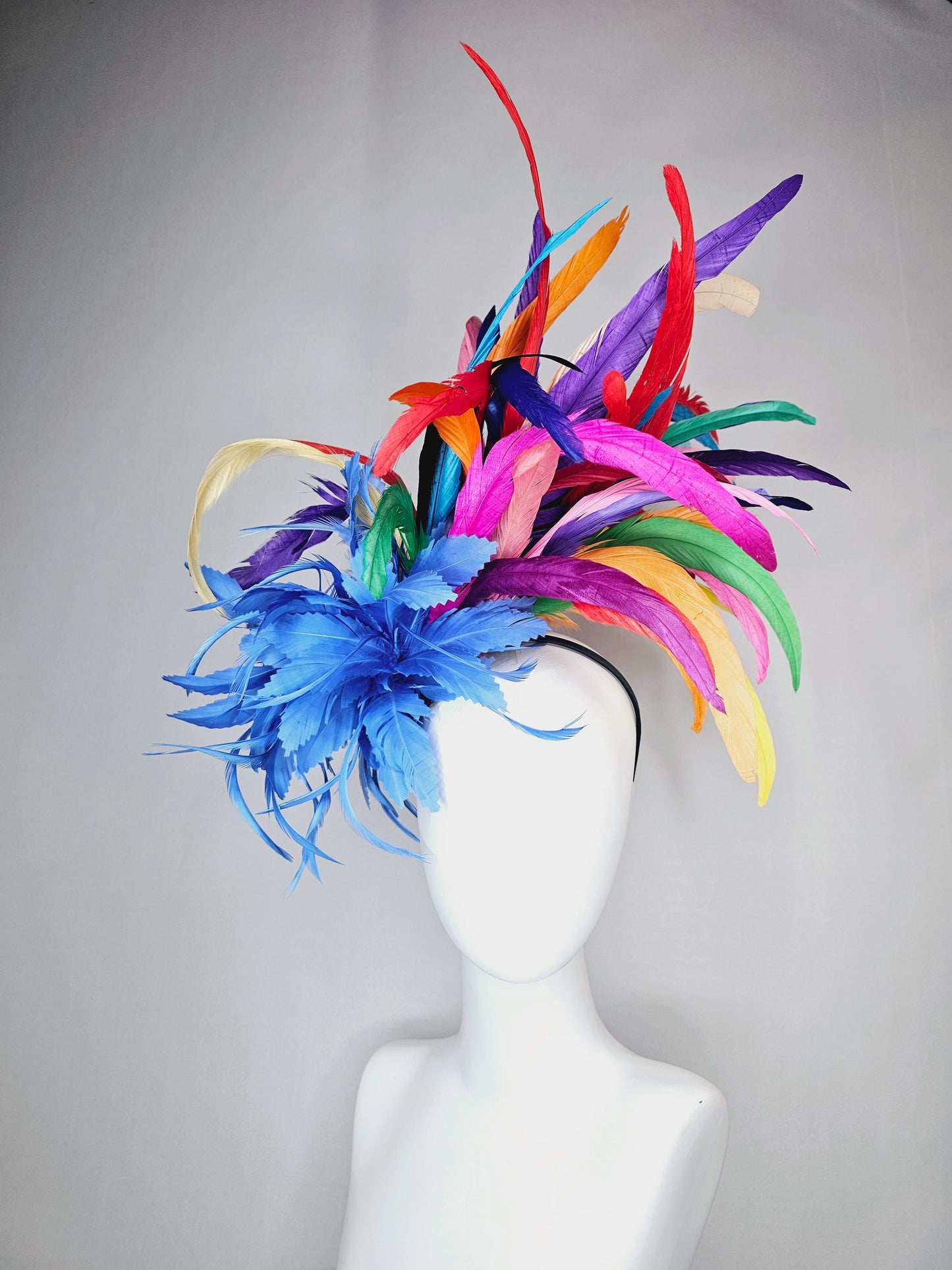kentucky derby hat fascinator royal blue zigzag feather flower with colorful rainbow red pink purple yellow green branching feathers